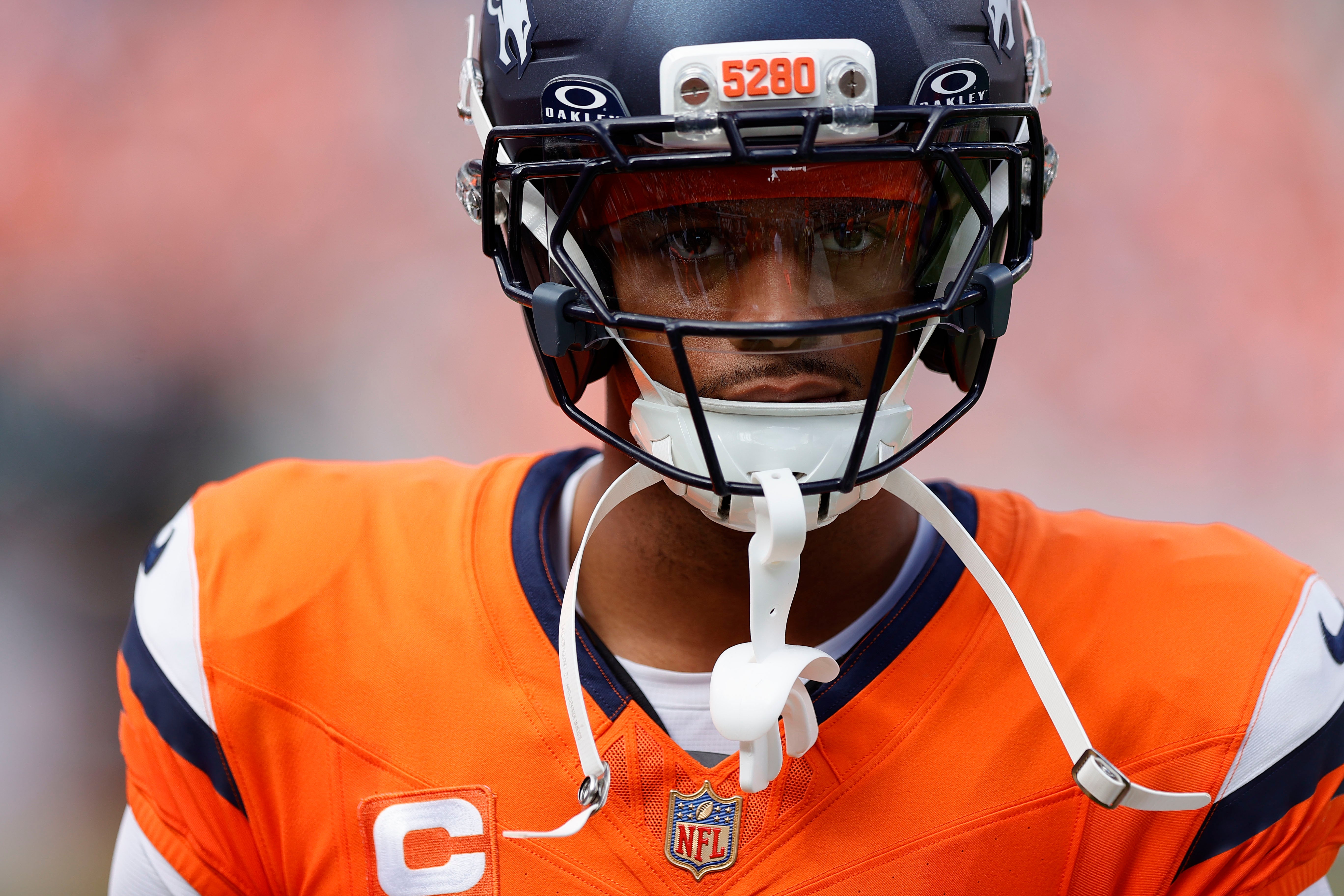 Sep 7, 2025; Denver, Colorado, USA; Denver Broncos cornerback Pat Surtain II (2) displays a gold shield logo patch on his uniform in the second half at Empower Field at Mile High.