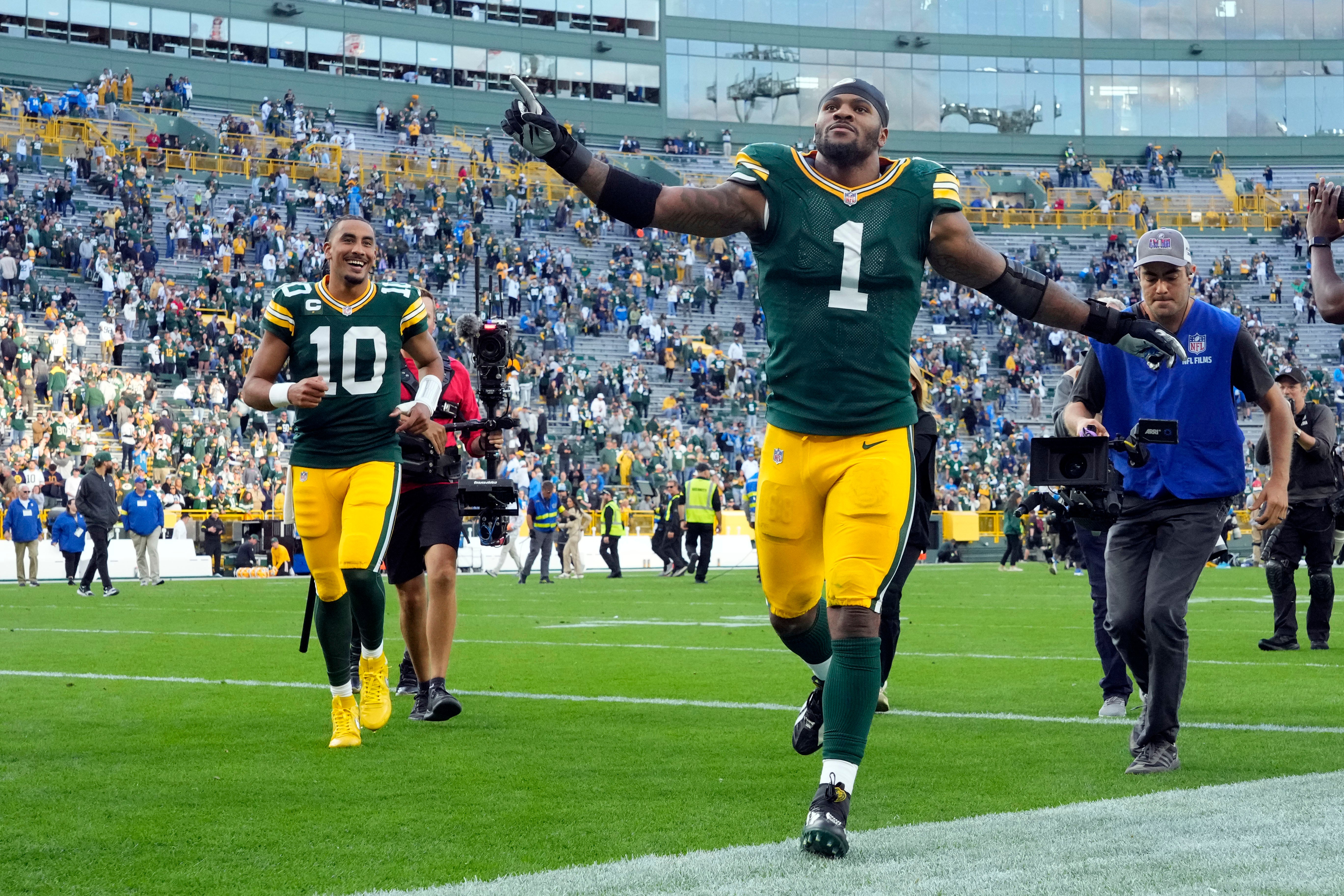 Sep 7, 2025; Green Bay, Wisconsin, USA; Green Bay Packers defensive end Micah Parsons (1) celebrates after their win against the Detroit Lions at Lambeau Field.