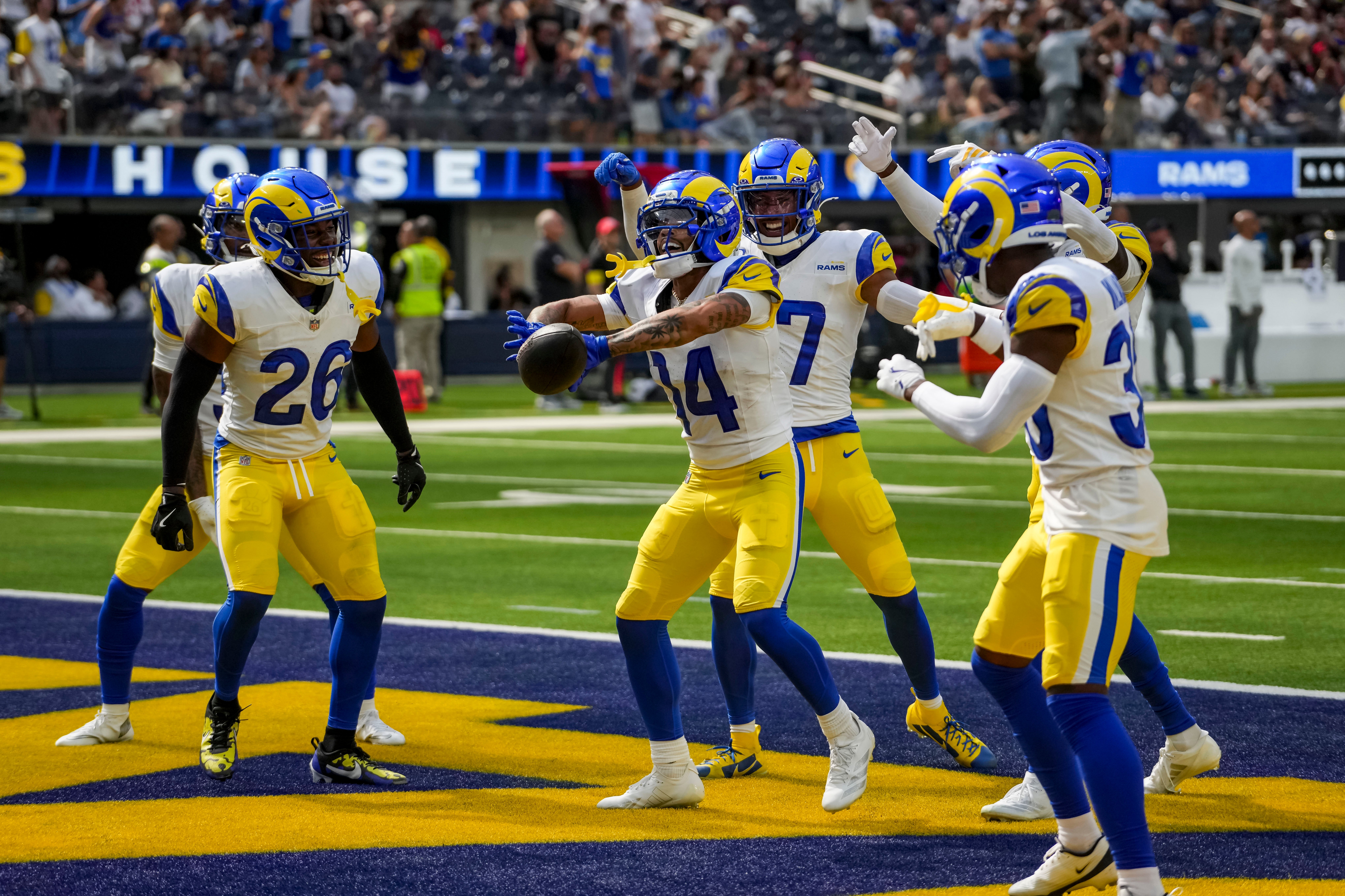 Sep 7, 2025; Inglewood, California, USA; Los Angeles Rams cornerback Cobie Durant (14) celebrates after intercepting a pass during the fourth quarter at SoFi Stadium
