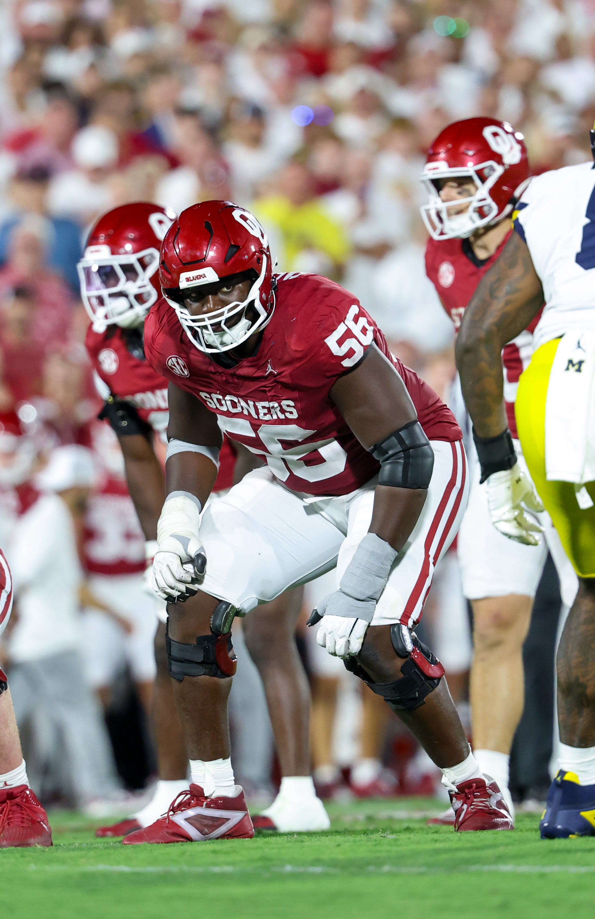 Sep 6, 2025; Norman, Oklahoma, USA; Oklahoma Sooners offensive lineman Michael Fasusi (56) in action during the second half against the Michigan Wolverines at Gaylord Family-Oklahoma Memorial Stadium.