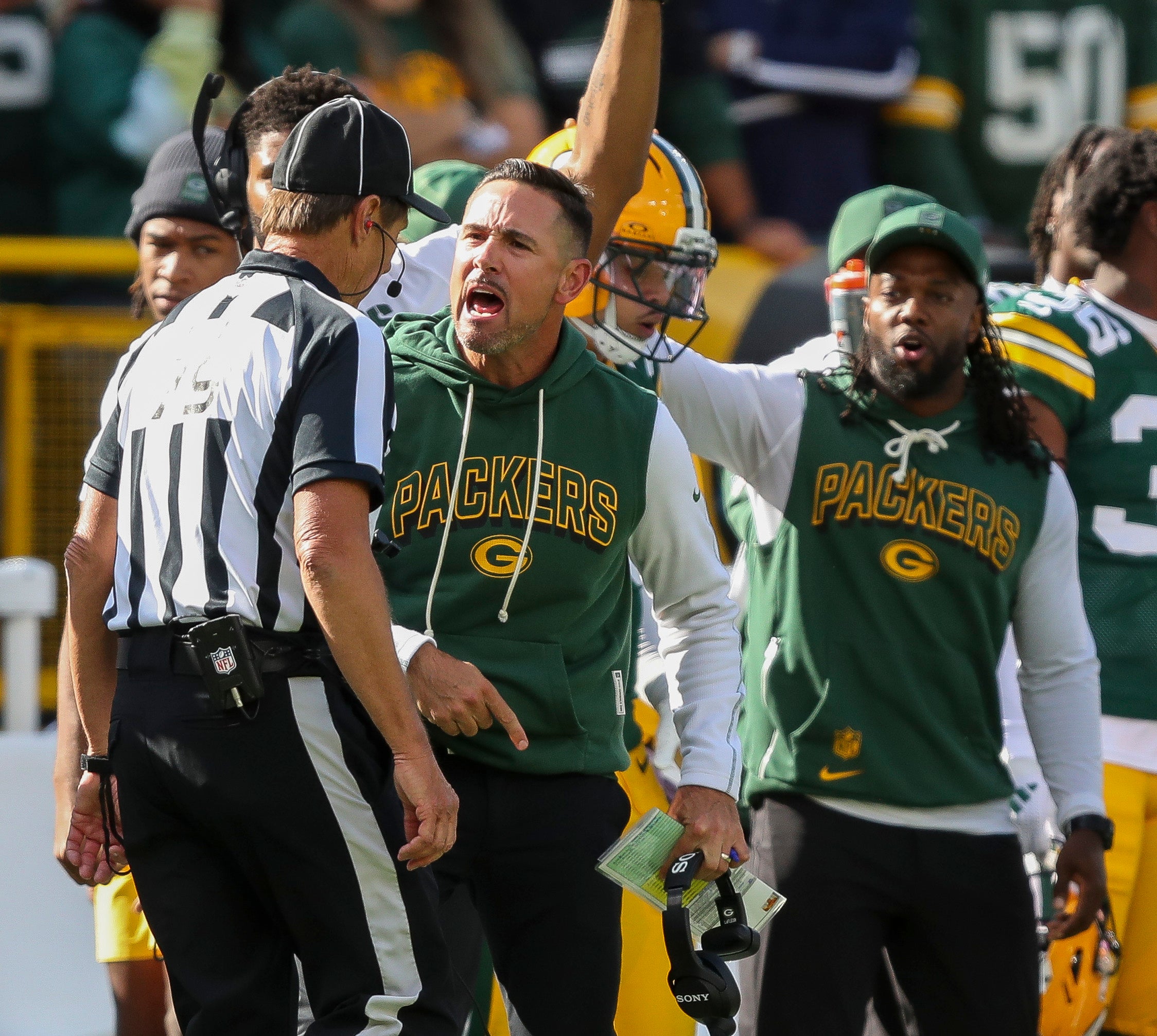 Sep 7, 2025; Green Bay, Wisconsin, USA; Green Bay Packers head coach Matt LaFleur argues with a referee after a taunting penalty is called against Packers safety Xavier McKinney against the Detroit Lions during the first half at Lambeau Field.