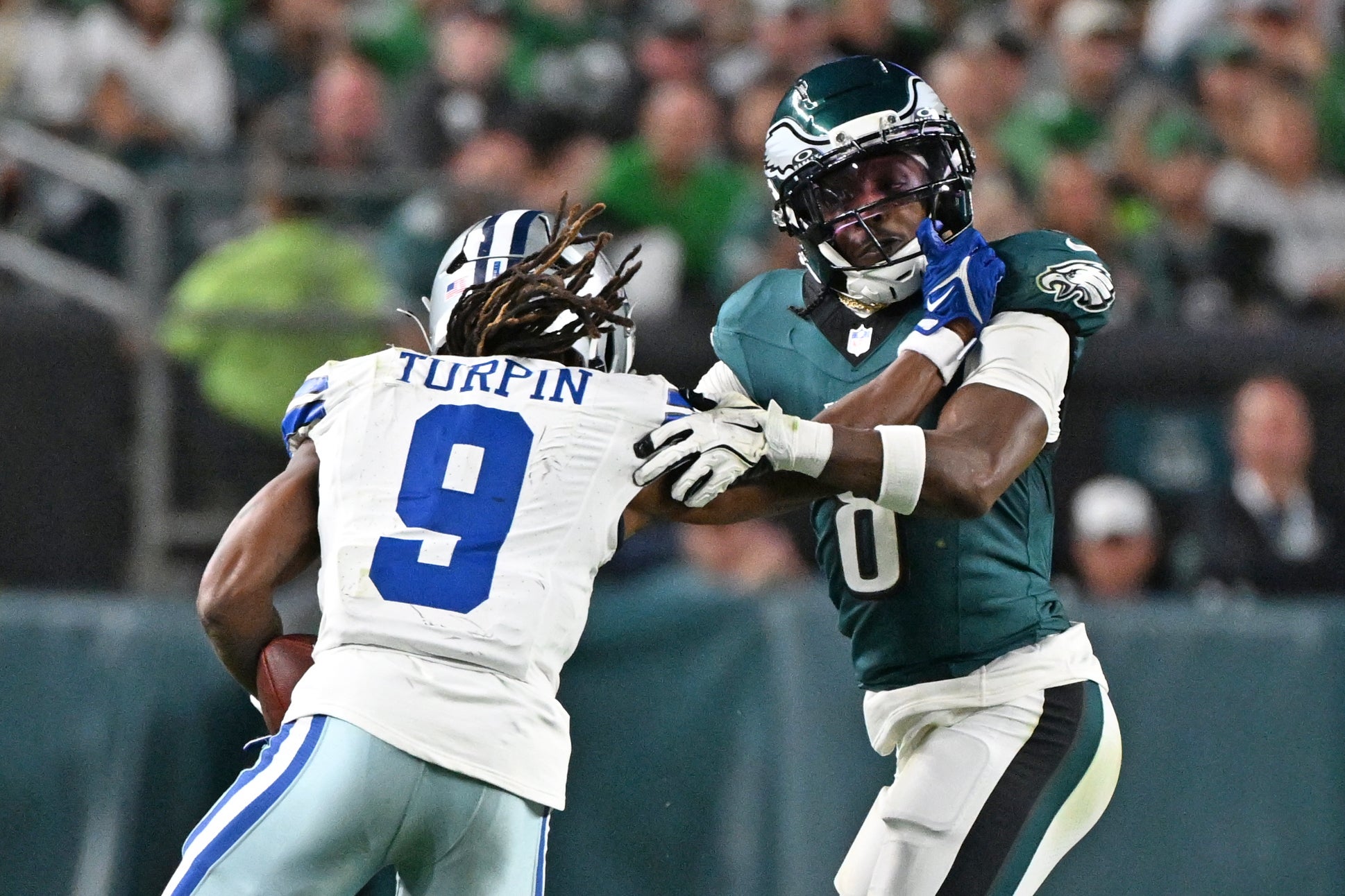 Dallas Cowboys wide receiver KaVontae Turpin (9) pushes off against Philadelphia Eagles cornerback Adoree' Jackson (8) at Lincoln Financial Field.