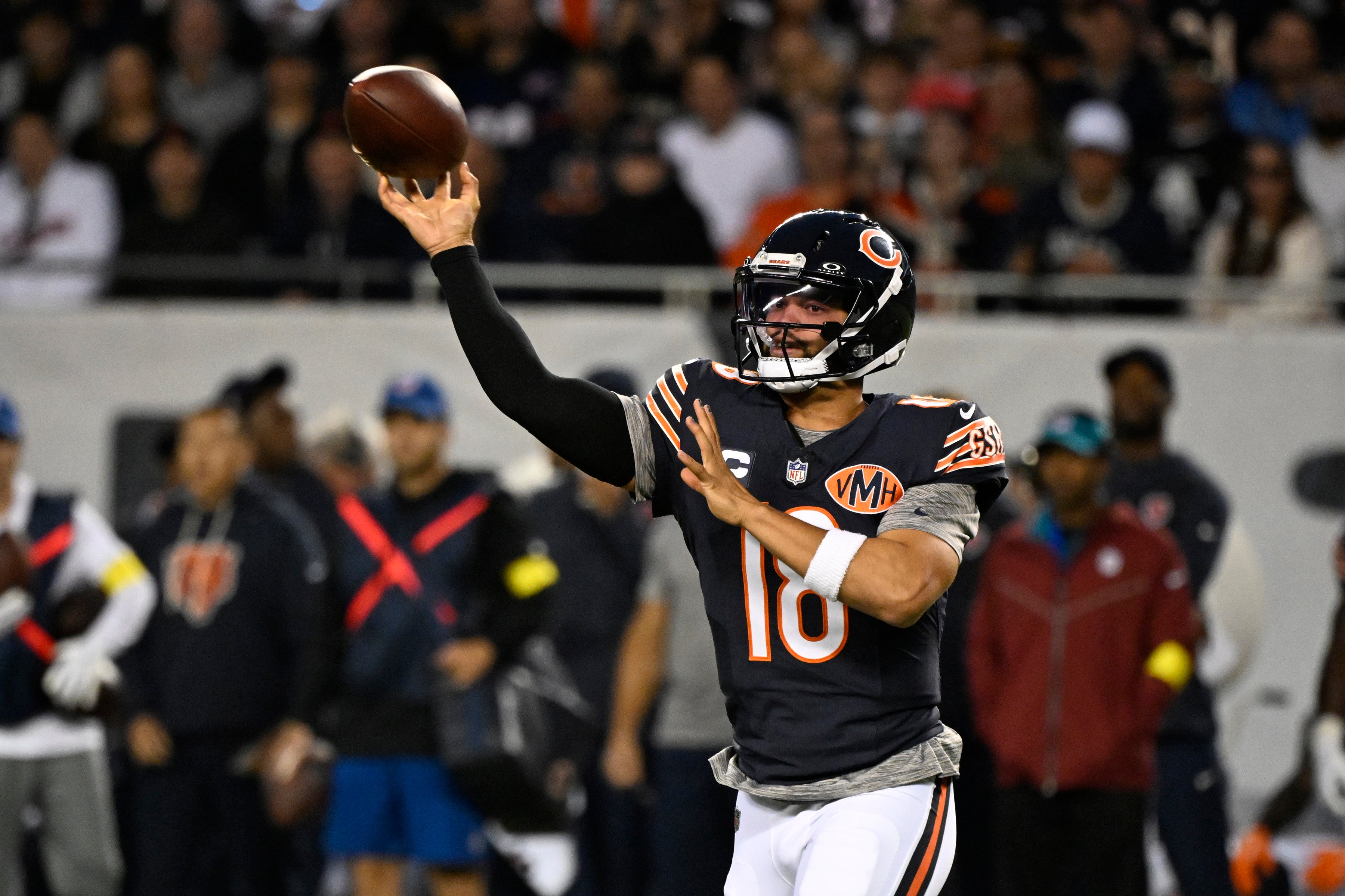Sep 8, 2025; Chicago, Illinois, USA; Chicago Bears quarterback Caleb Williams (18) drops back to pass against the Minnesota Vikings during the first half at Soldier Field.