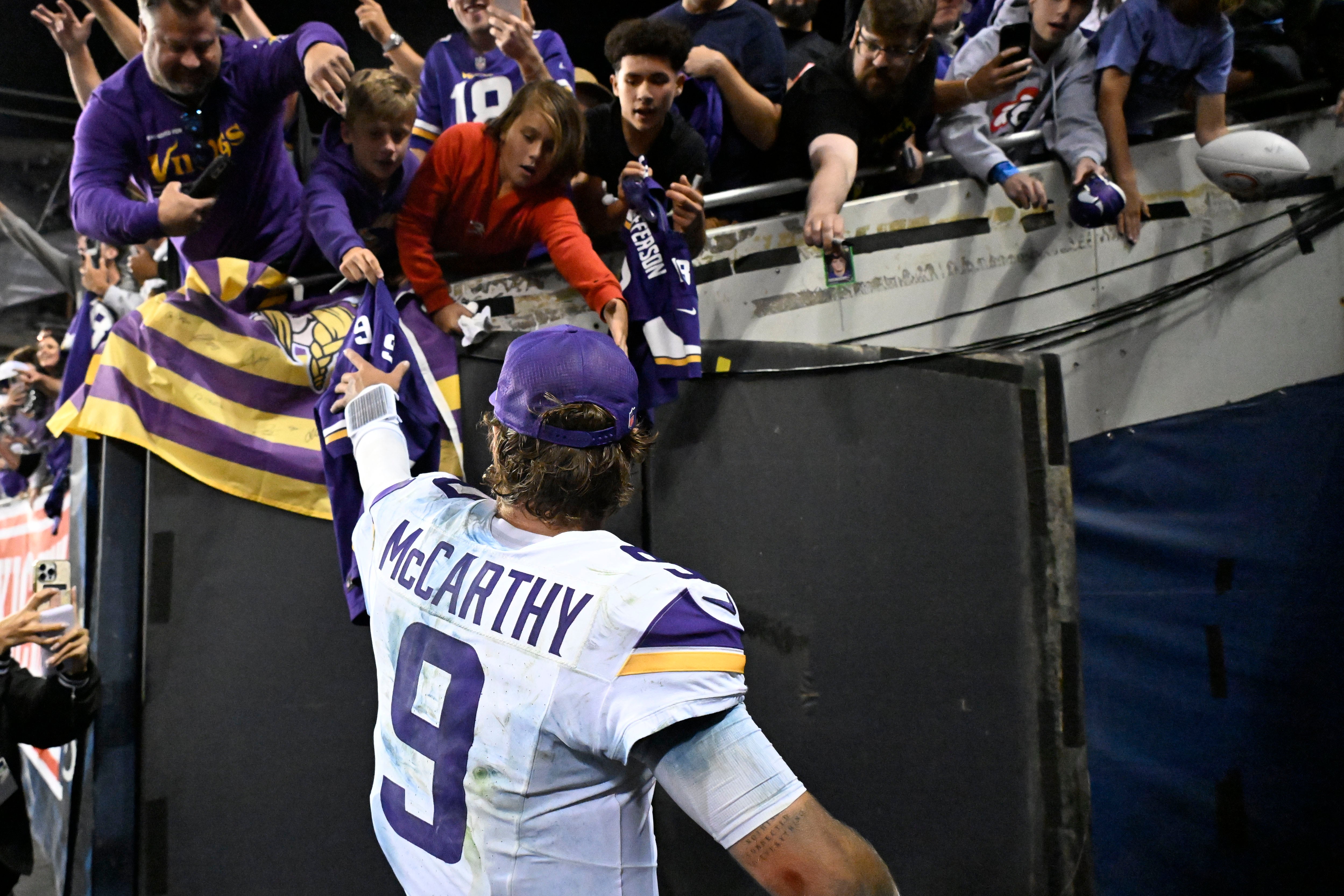 Sep 8, 2025; Chicago, Illinois, USA; Minnesota Vikings quarterback J.J. McCarthy (9) reacts after defeating the Chicago Bears at Soldier Field.
