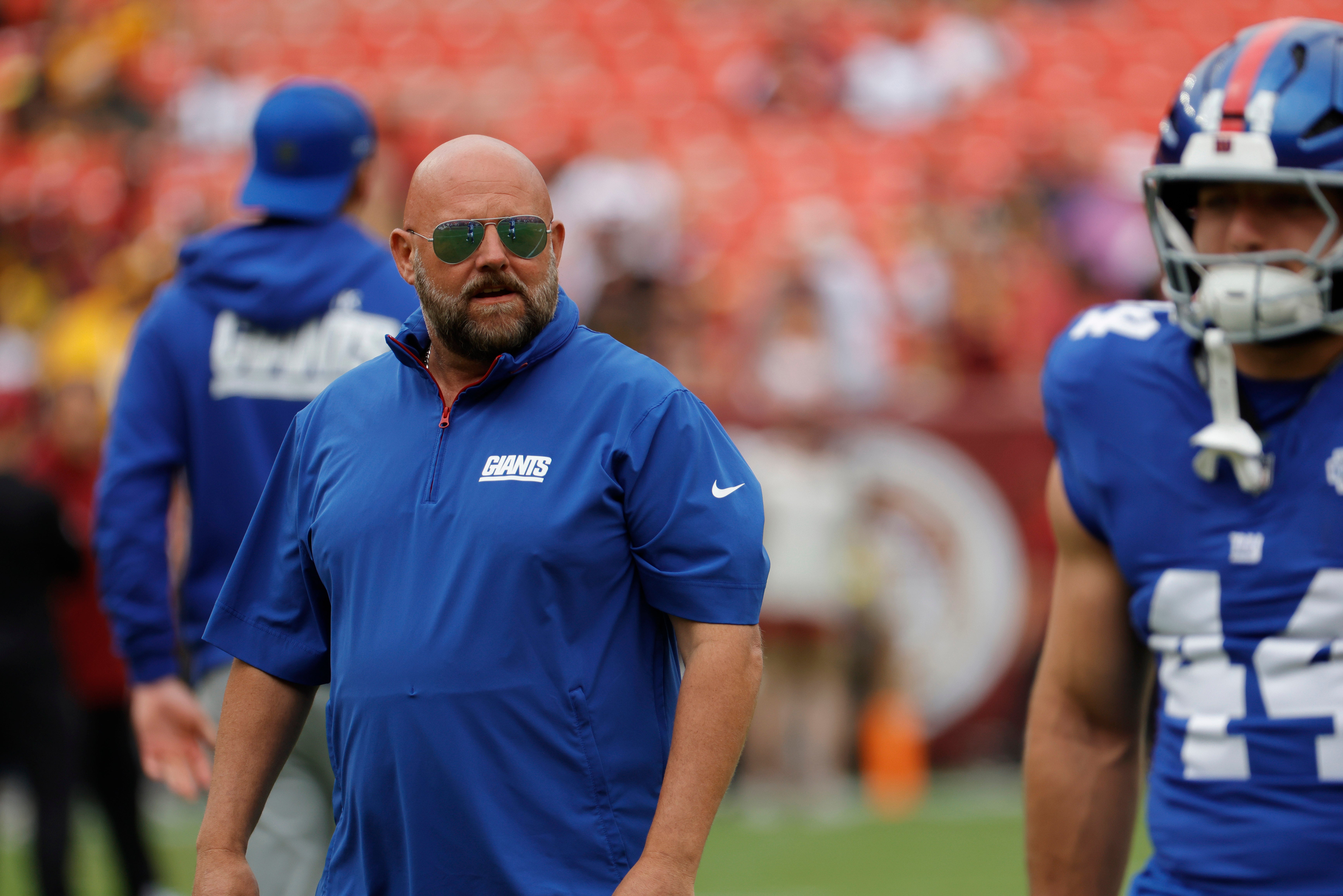 Sep 7, 2025; Landover, Maryland, USA; New York Giants head coach Brian Daboll looks on from the field prior to the game against the New York Giants at Northwest Stadium.