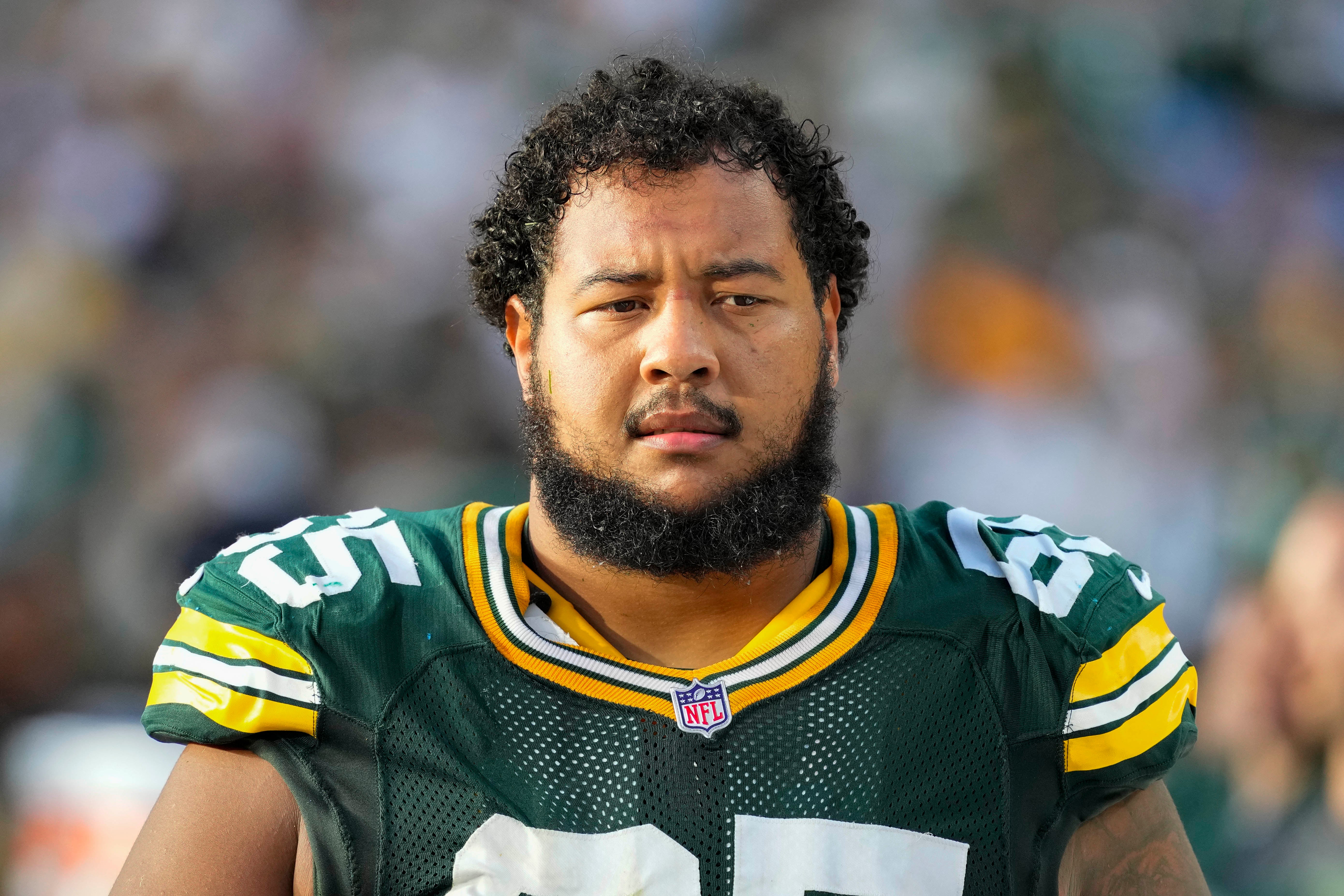 Sep 7, 2025; Green Bay, Wisconsin, USA; Green Bay Packers guard Aaron Banks (65) during the game against the Detroit Lions at Lambeau Field.