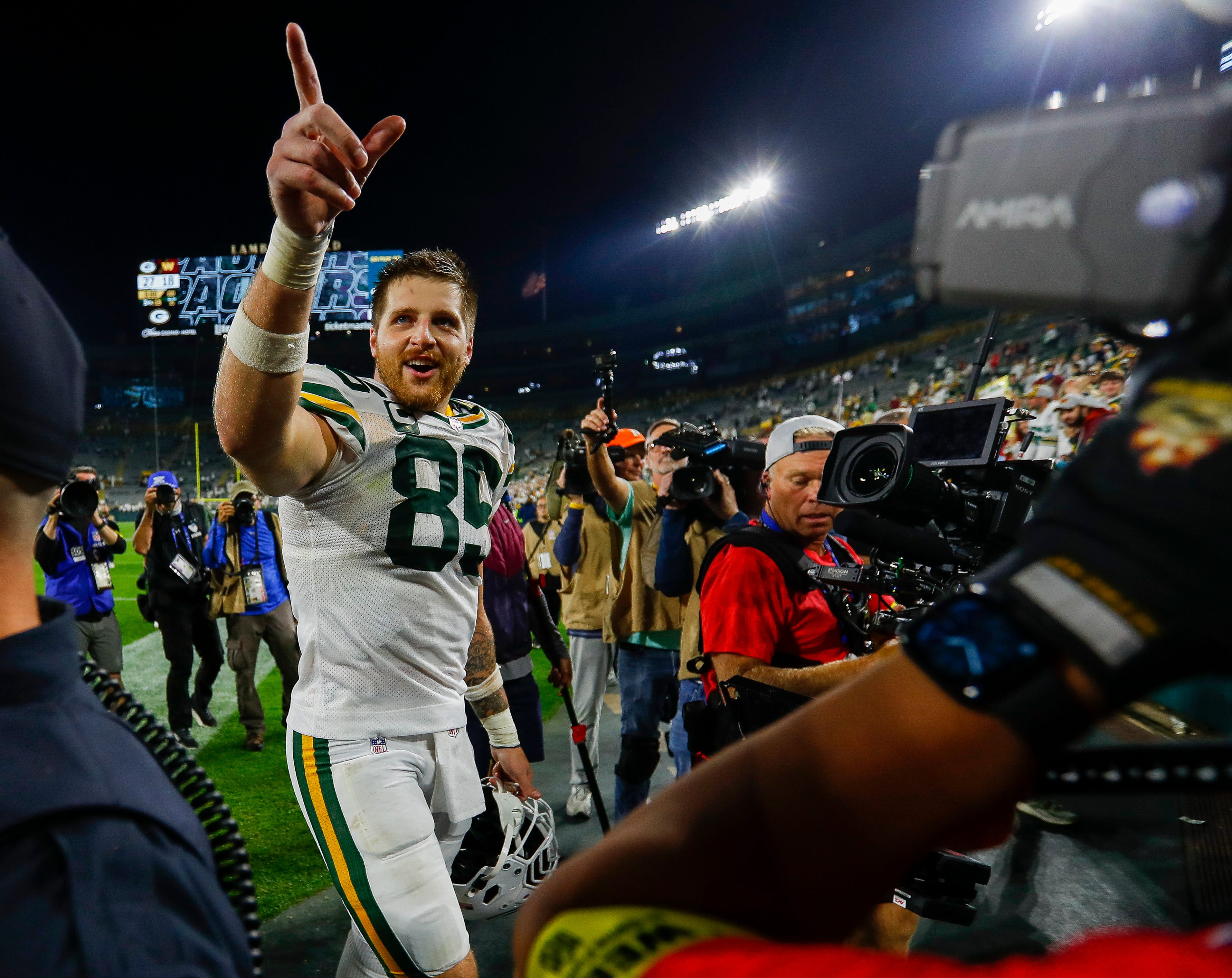 Green Bay Packers tight end Tucker Kraft (85) points to the crowd as he walks off the field after defeating the Washington Commanders on Thursday, September 11, 2025, at Lambeau Field in Green Bay, Wis. The Packers won the game, 27-18.
