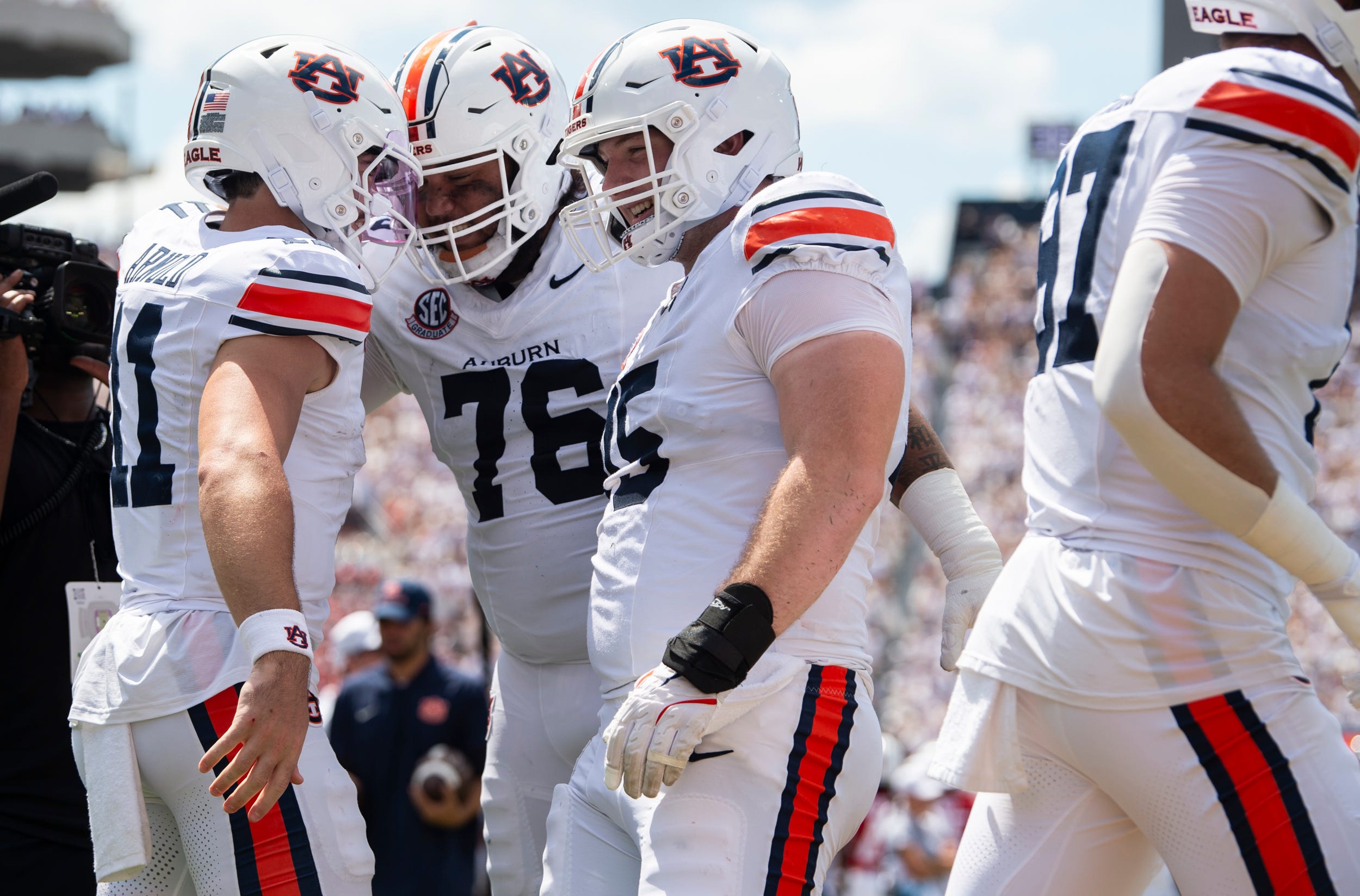 Auburn Tigers quarterback Jackson Arnold (11) celebrates his touchdown run as Auburn Tigers take on South Alabama Jaguars at Jordan-Hare Stadium in Auburn, Ala. on Saturday, Sept. 13, 2025. Auburn Tigers lead South Alabama Jaguars 28-9 at halftime.