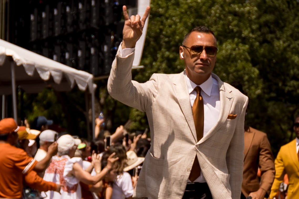 Texas head football coach Steve Sarkisian walks through the Texas team parade before a football game against UTEP at Darrell K Royal–Texas Memorial Stadium in Austin, Texas, on Saturday, Sept. 13, 2025.