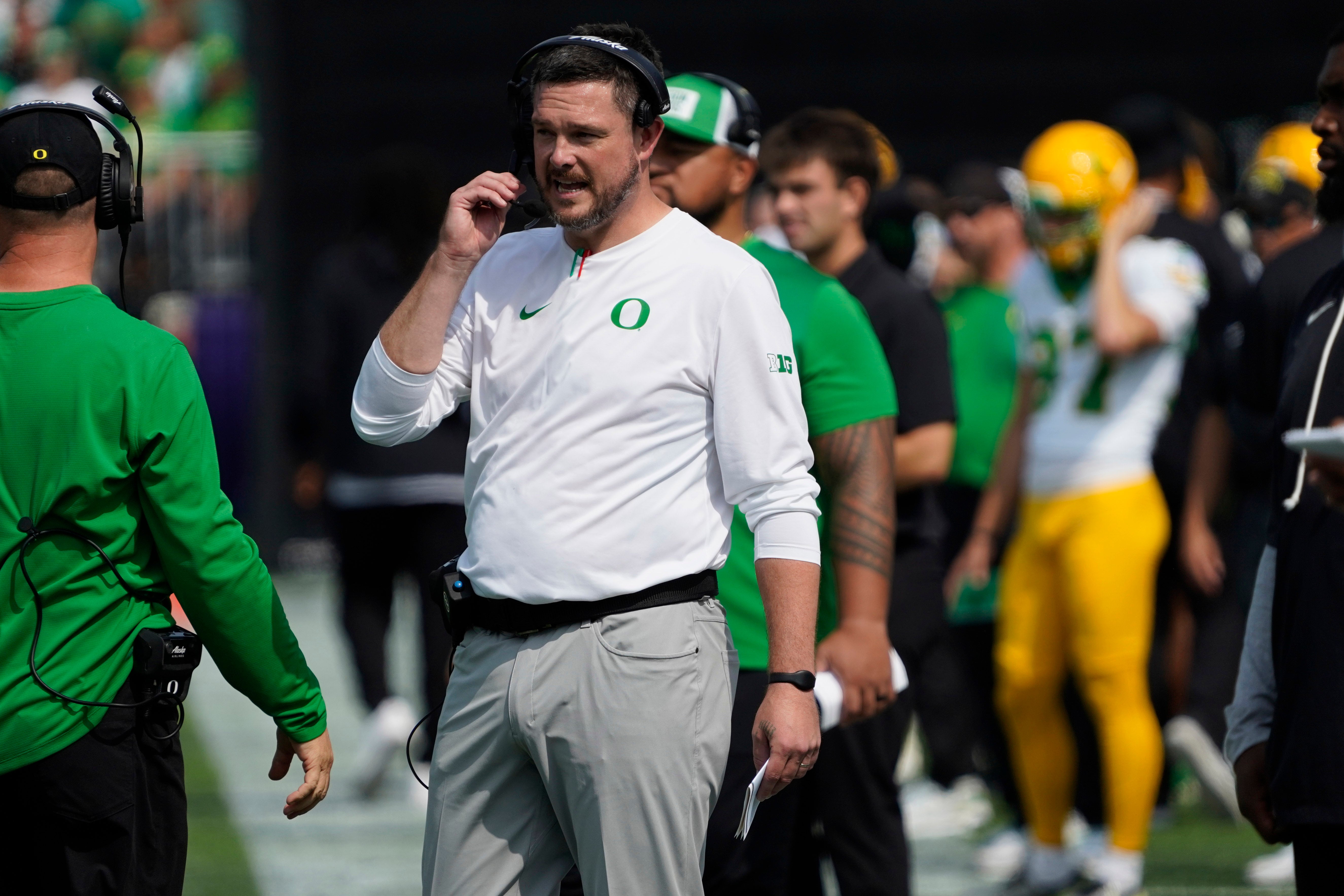 Sep 13, 2025; Evanston, Illinois, USA; Oregon Ducks head coach Dan Lanning on the sideline against the Northwestern Wildcats during the first half at Northwestern Medicine Field at Martin Stadium. Mandatory Credit: David Banks-Imagn Images