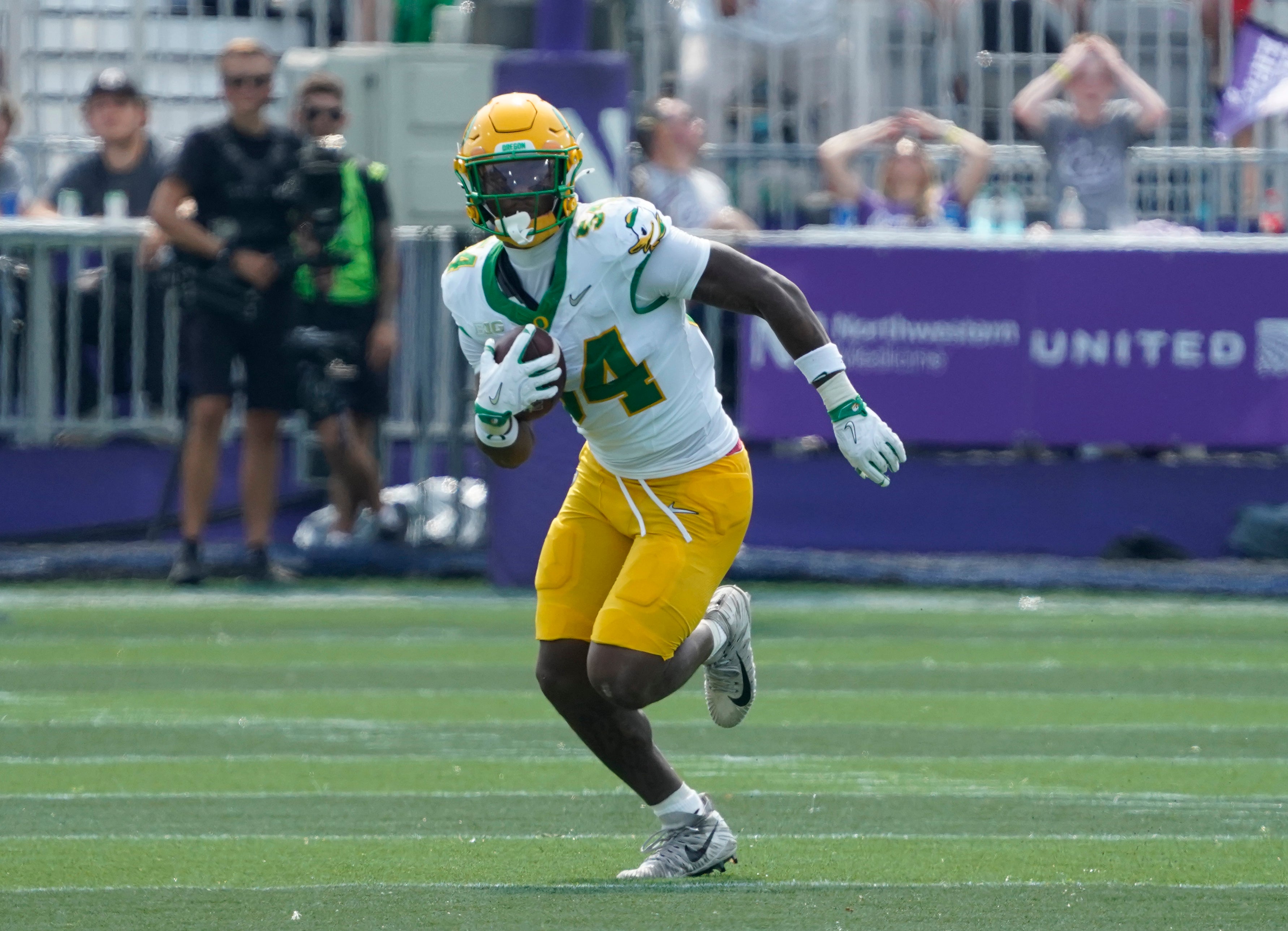Sep 13, 2025; Evanston, Illinois, USA; Oregon Ducks linebacker Jerry Mixon (54) intercepts a pass against the Northwestern Wildcats during the second half at Northwestern Medicine Field at Martin Stadium. Mandatory Credit: David Banks-Imagn Images