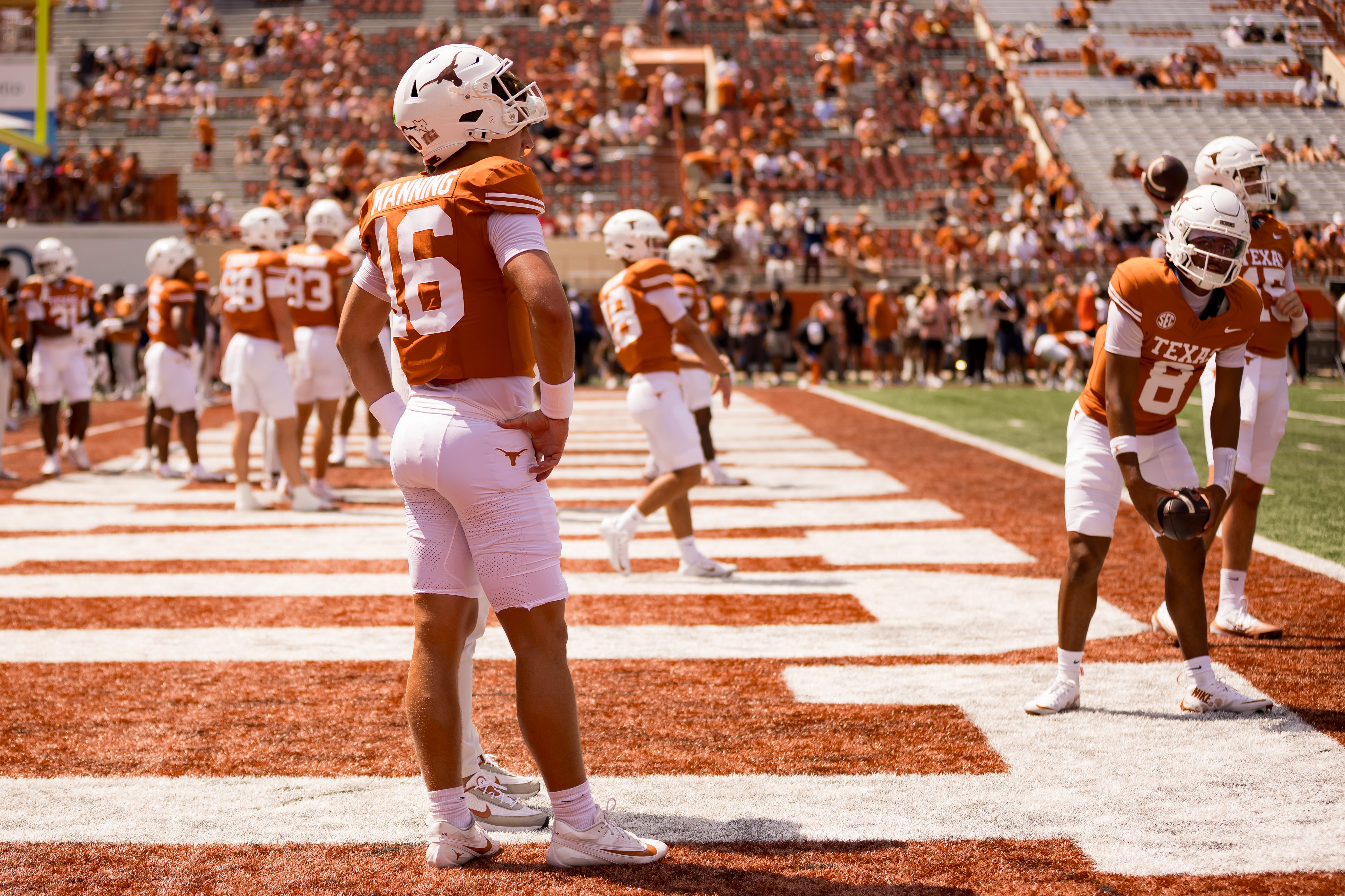 Texas football player, Arch Manning, stands on the field during warm up before a game against UTEP at Darrell K Royal–Texas Memorial Stadium in Austin, Texas, on Saturday, Sept. 13, 2025.