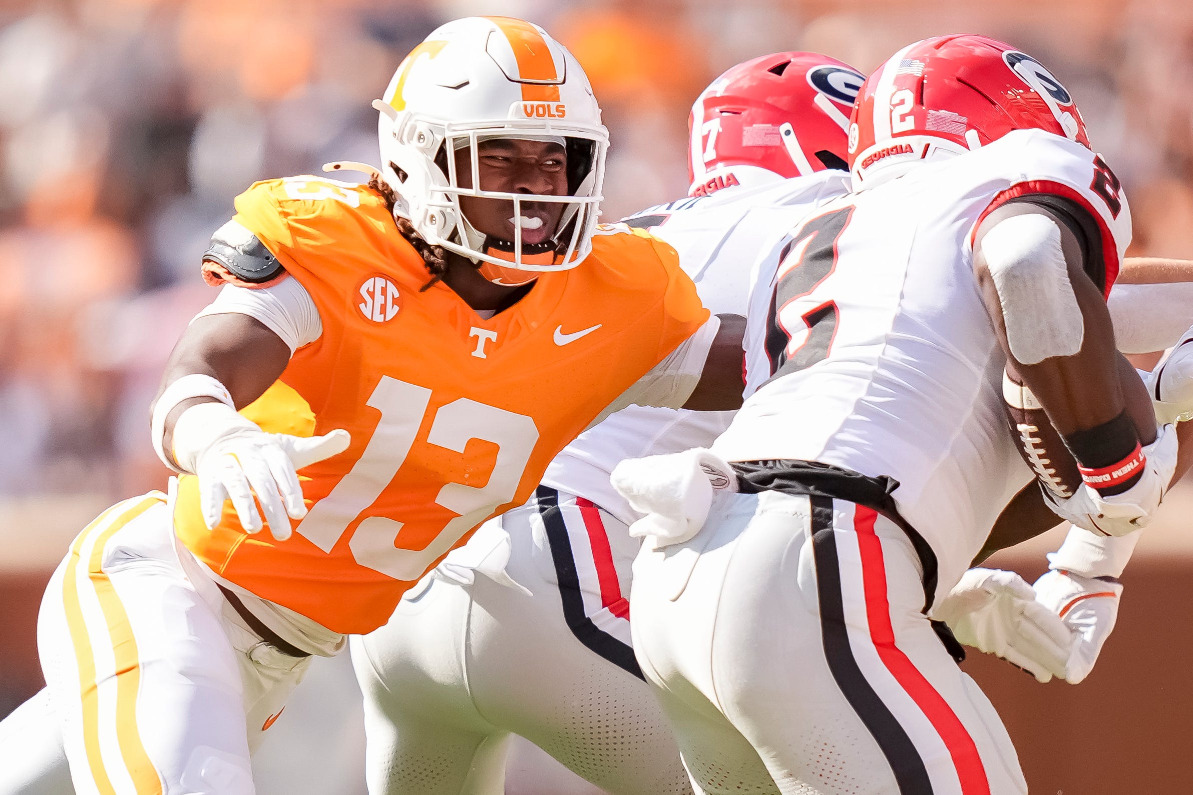 Tennessee linebacker Edwin Spillman (13) chases down Georgia running back Josh McCray (2) during a college football game between Tennessee and Georgia at Neyland Stadium in Knoxville, Tenn., on Sept.