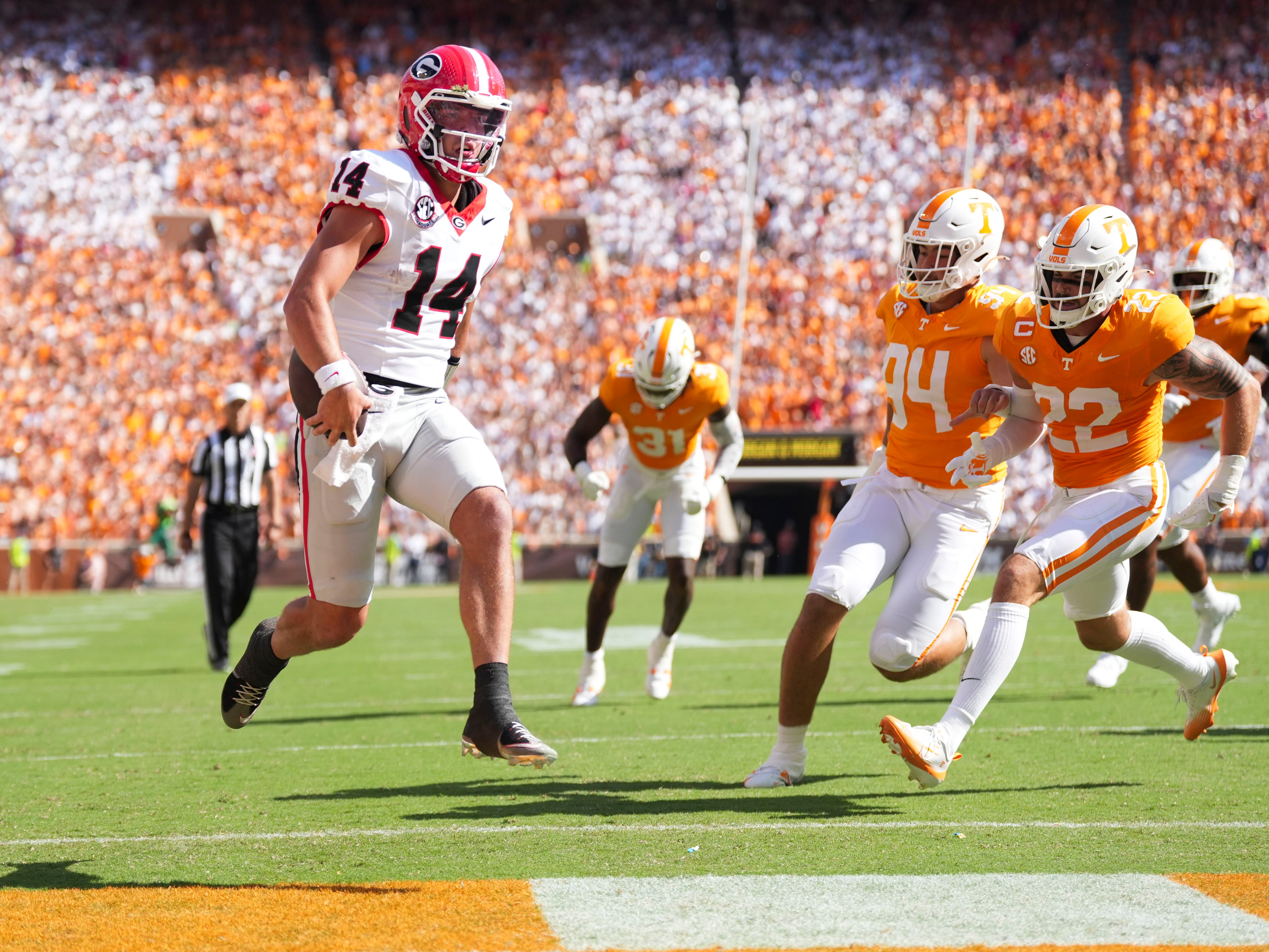 Georgia quarterback Gunner Stockton (14) runs the ball in for a touchdown during an NCAA college football game against Tennessee on September 13, 2025, Knoxville, Tennessee.