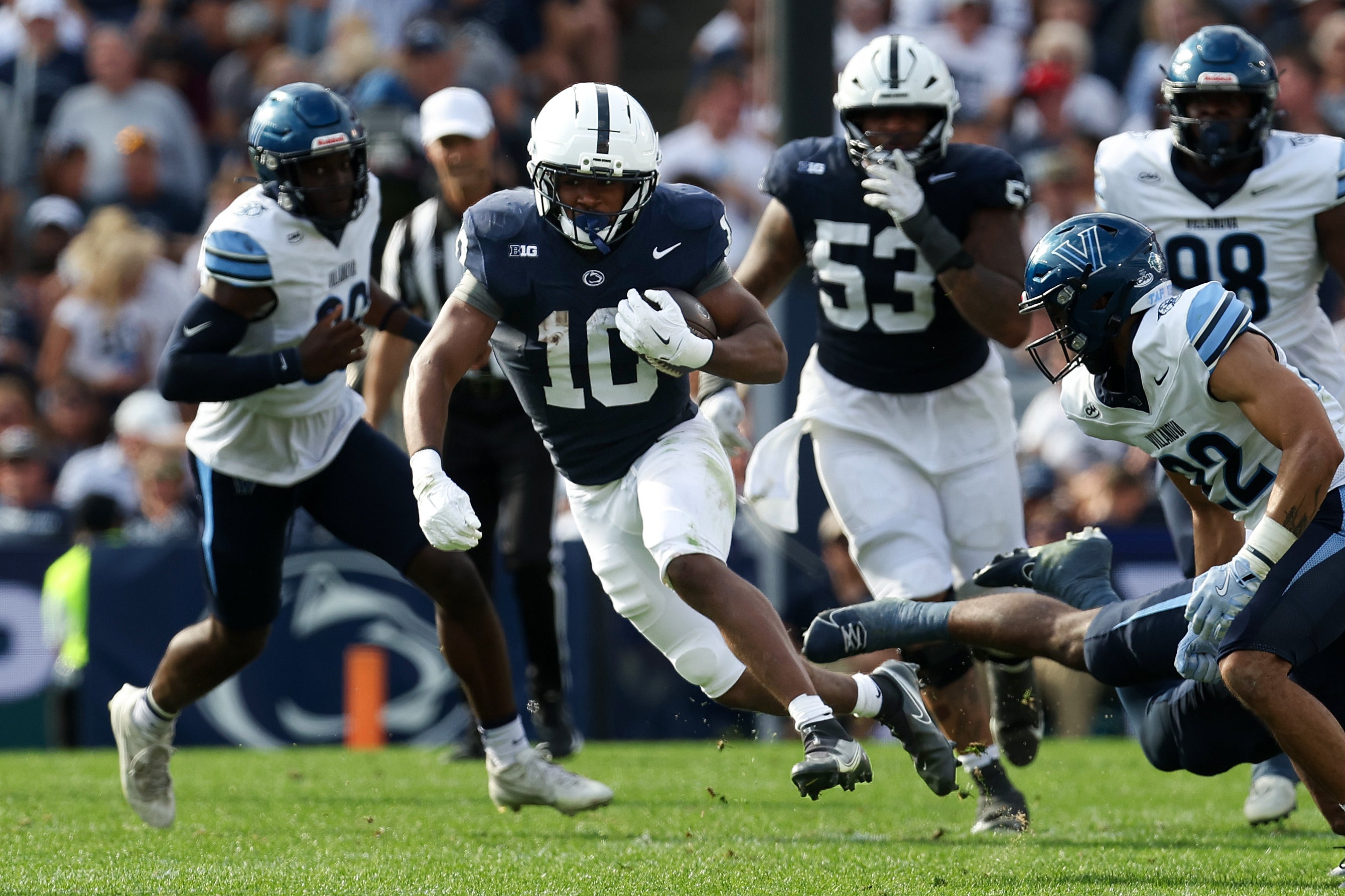 Sep 13, 2025; University Park, Pennsylvania, USA; Penn State Nittany Lions running back Nicholas Singleton (10) runs with the ball during the second quarter against the Villanova Wildcats at Beaver Stadium. Mandatory Credit: Matthew O'Haren-Imagn Images