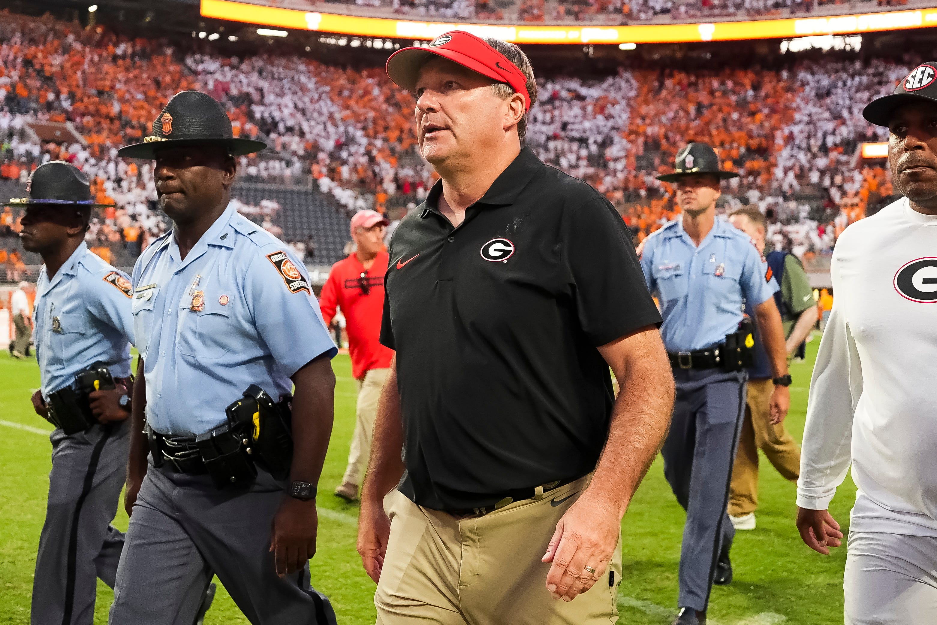 Georgia head coach Kirby Smart walks off the field after an overtime win against Tennessee at Neyland Stadium in Knoxville, Tenn., on Sept. 13, 2025