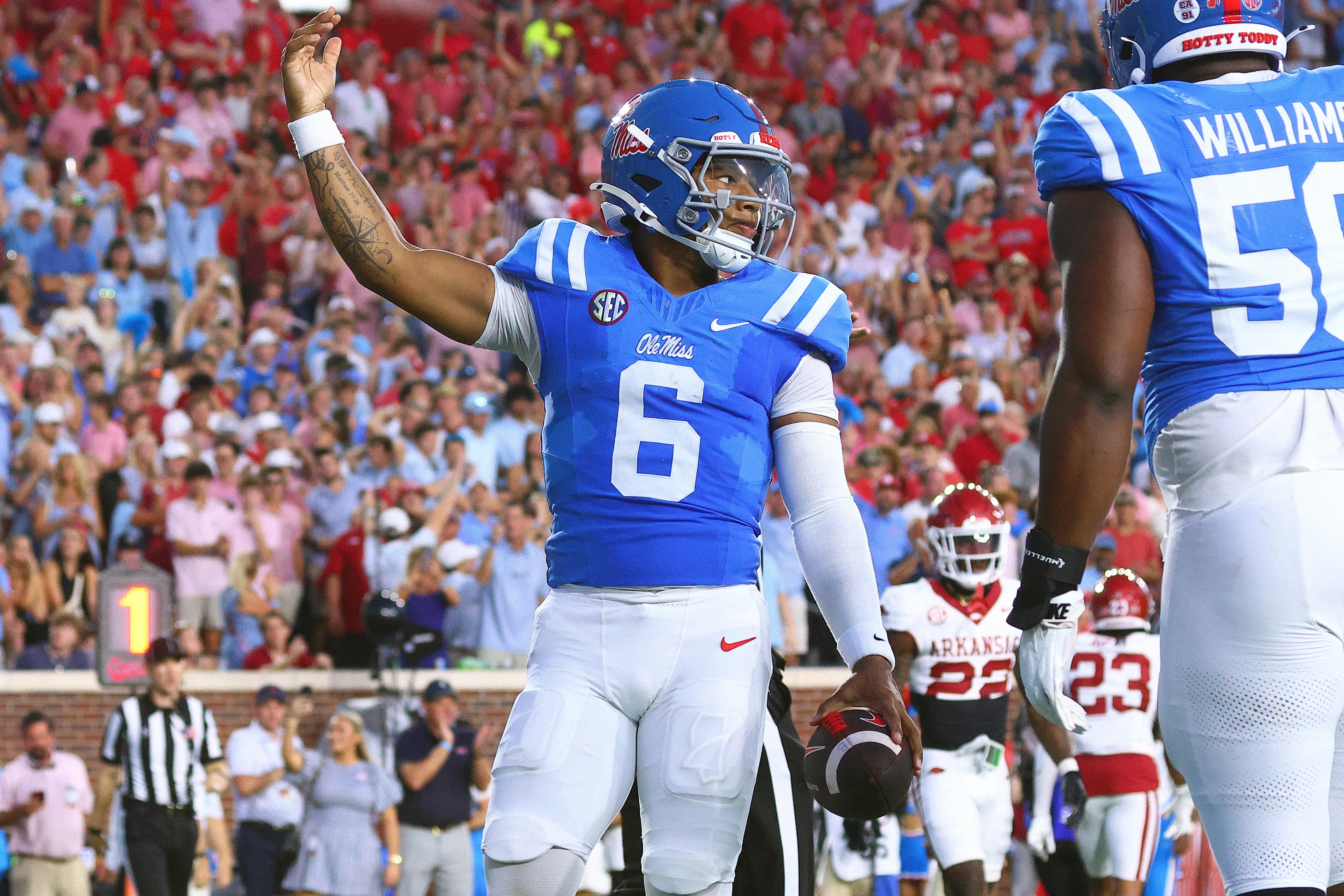 Sep 13, 2025; Oxford, Mississippi, USA; Mississippi Rebels quarterback Trinidad Chambliss (6) reacts after a touchdown run during the second quarter against the Arkansas Razorback at Vaught-Hemingway Stadium.