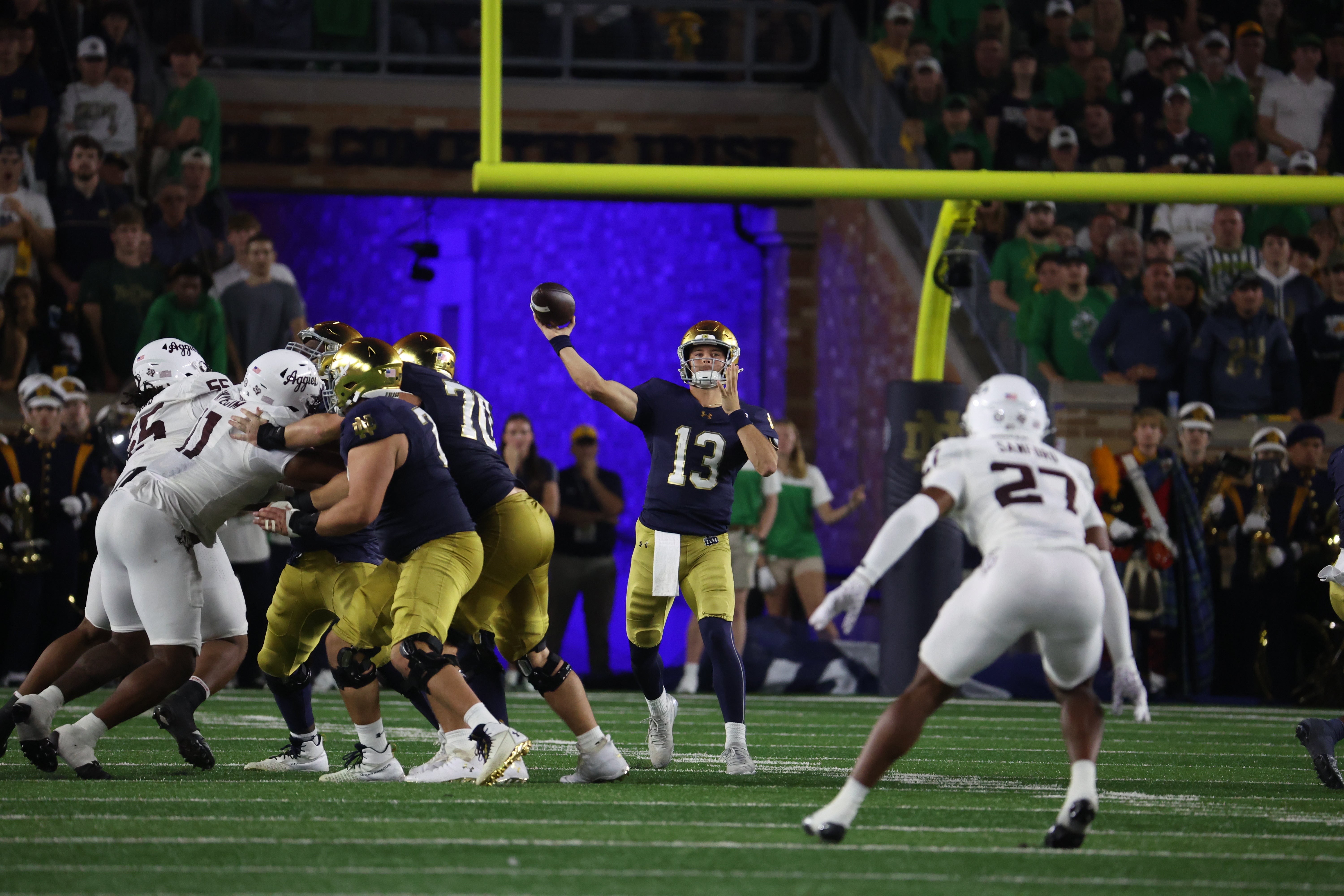 Sep 13, 2025; South Bend, Indiana, USA; Notre Dame Fighting Irish quarterback CJ Carr (13) makes a pass during the second half against the Texas A&M Aggies at Notre Dame Stadium. Mandatory Credit: Trevor Ruszkowski-Imagn Images