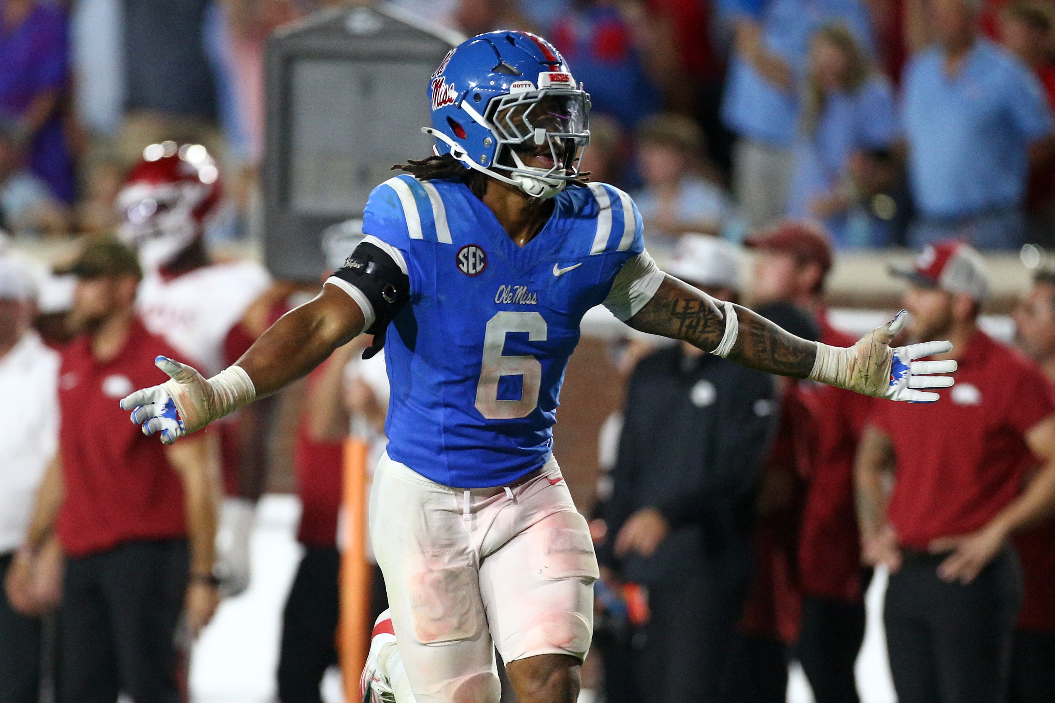 Sep 13, 2025; Oxford, Mississippi, USA; Mississippi Rebels linebacker TJ Dottery (6) reacts after a turnover during the fourth quarter against the Arkansas Razorback at Vaught-Hemingway Stadium.
