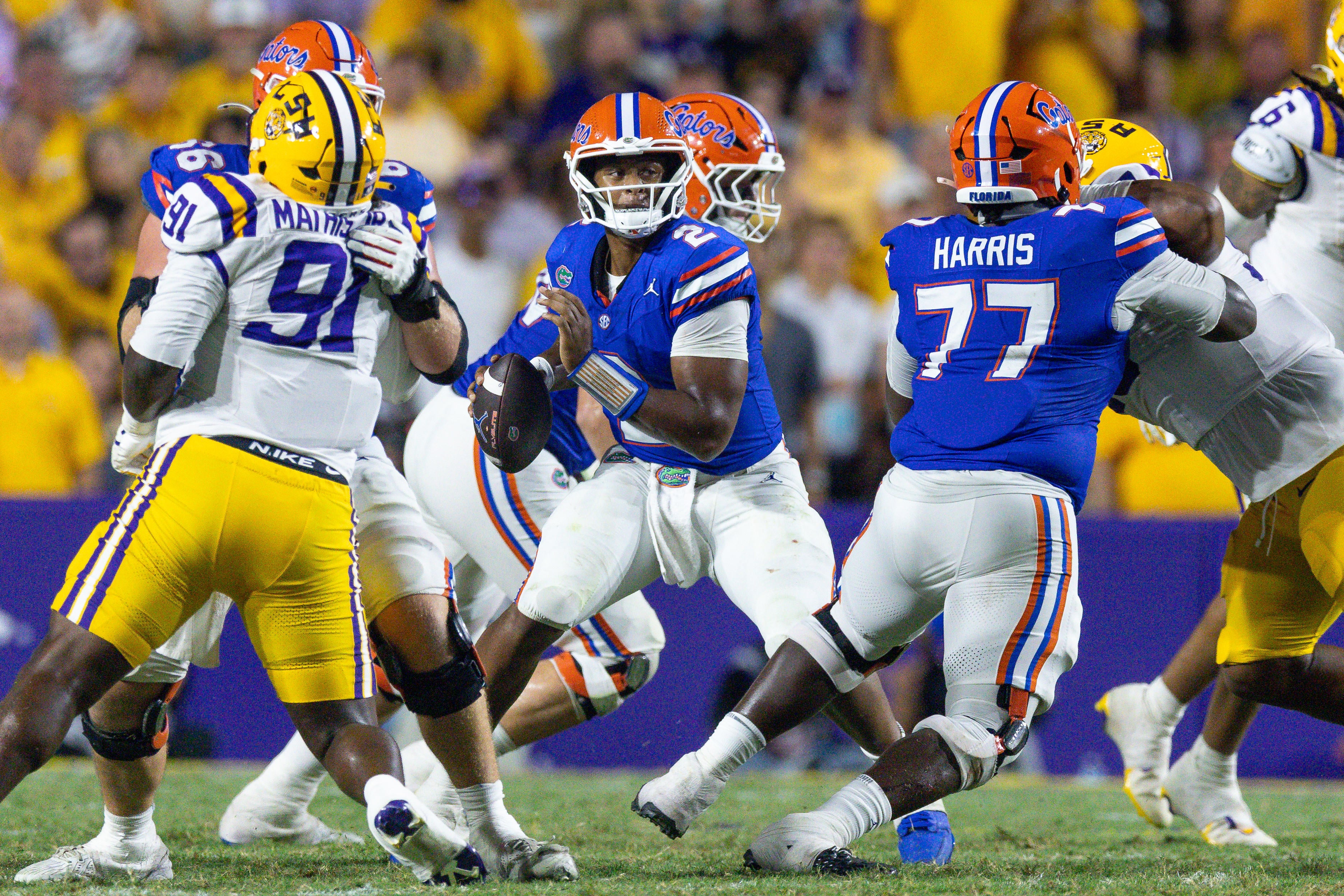 Sep 13, 2025; Baton Rouge, Louisiana, USA; Florida Gators quarterback DJ Lagway (2) against LSU Tigers defensive tackle Walter Mathis Jr. (91) during the second half at Tiger Stadium.