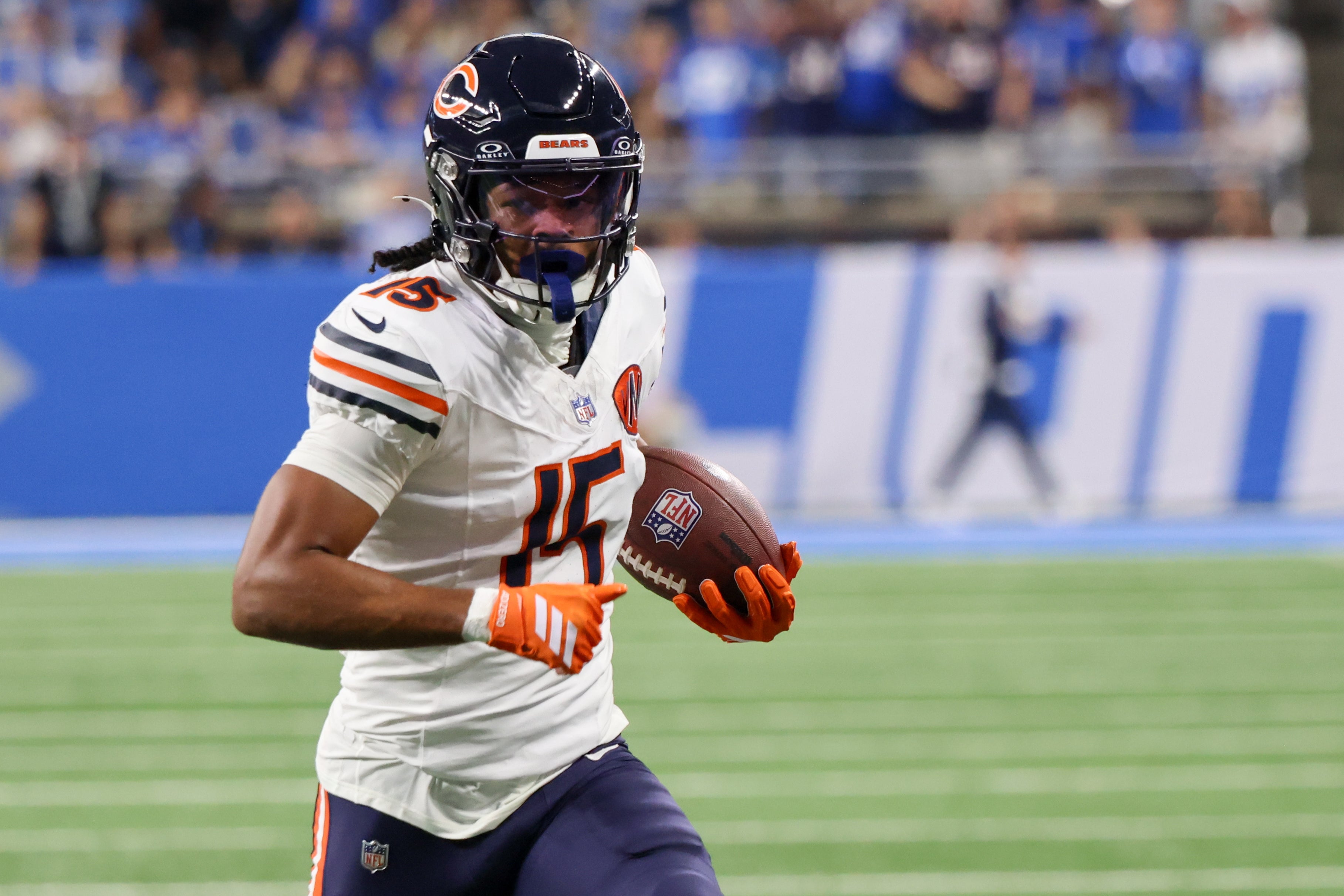 Sep 14, 2025; Detroit, Michigan, USA; Chicago Bears wide receiver Rome Odunze (15) carries the ball for a touchdown against the Detroit Lions during the first quarter at Ford Field.
