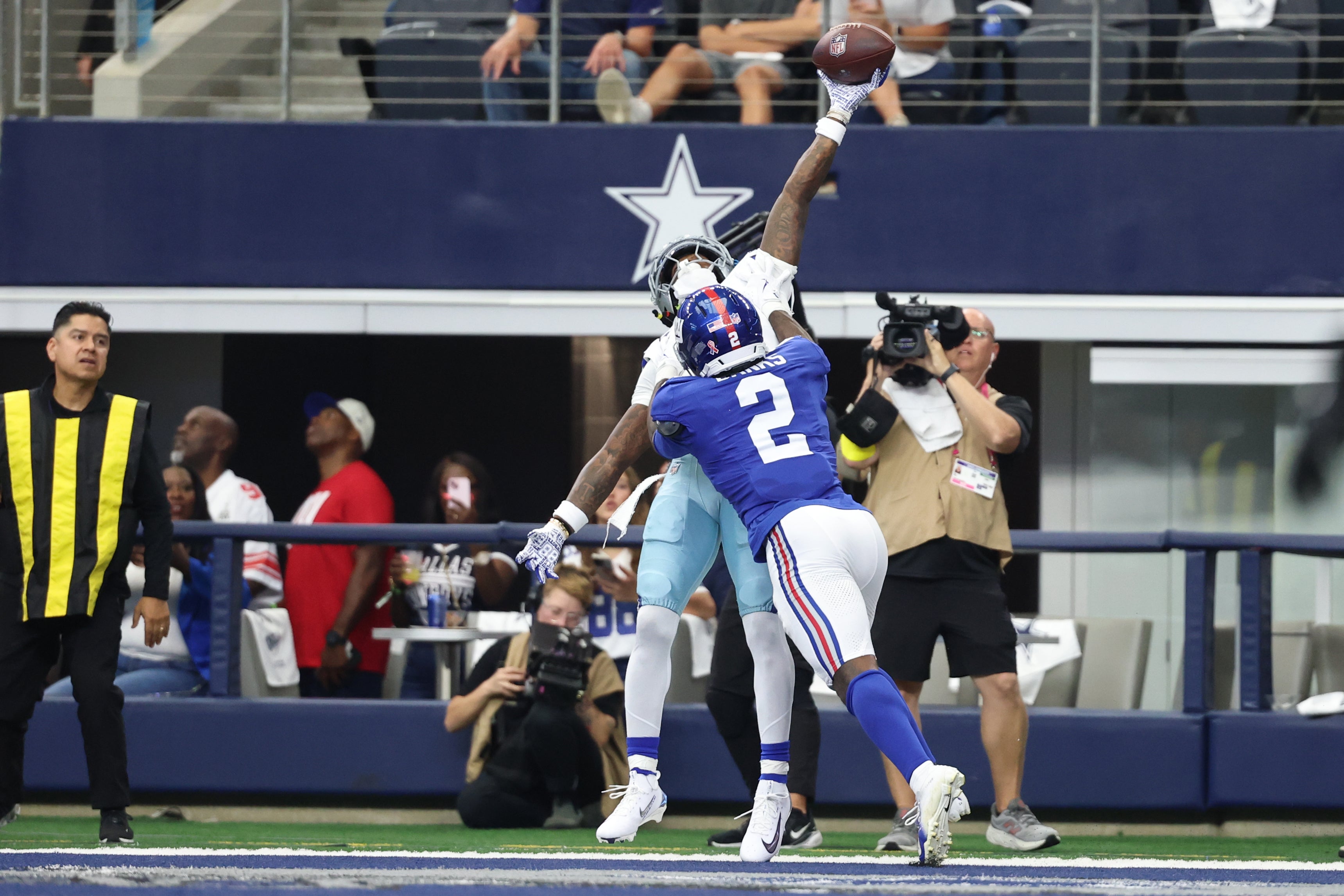 Sep 14, 2025; Arlington, Texas, USA; Dallas Cowboys wide receiver CeeDee Lamb (88) is unable to make a catch against New York Giants cornerback Deonte Banks (2) during the second quarter at AT&T Stadium.