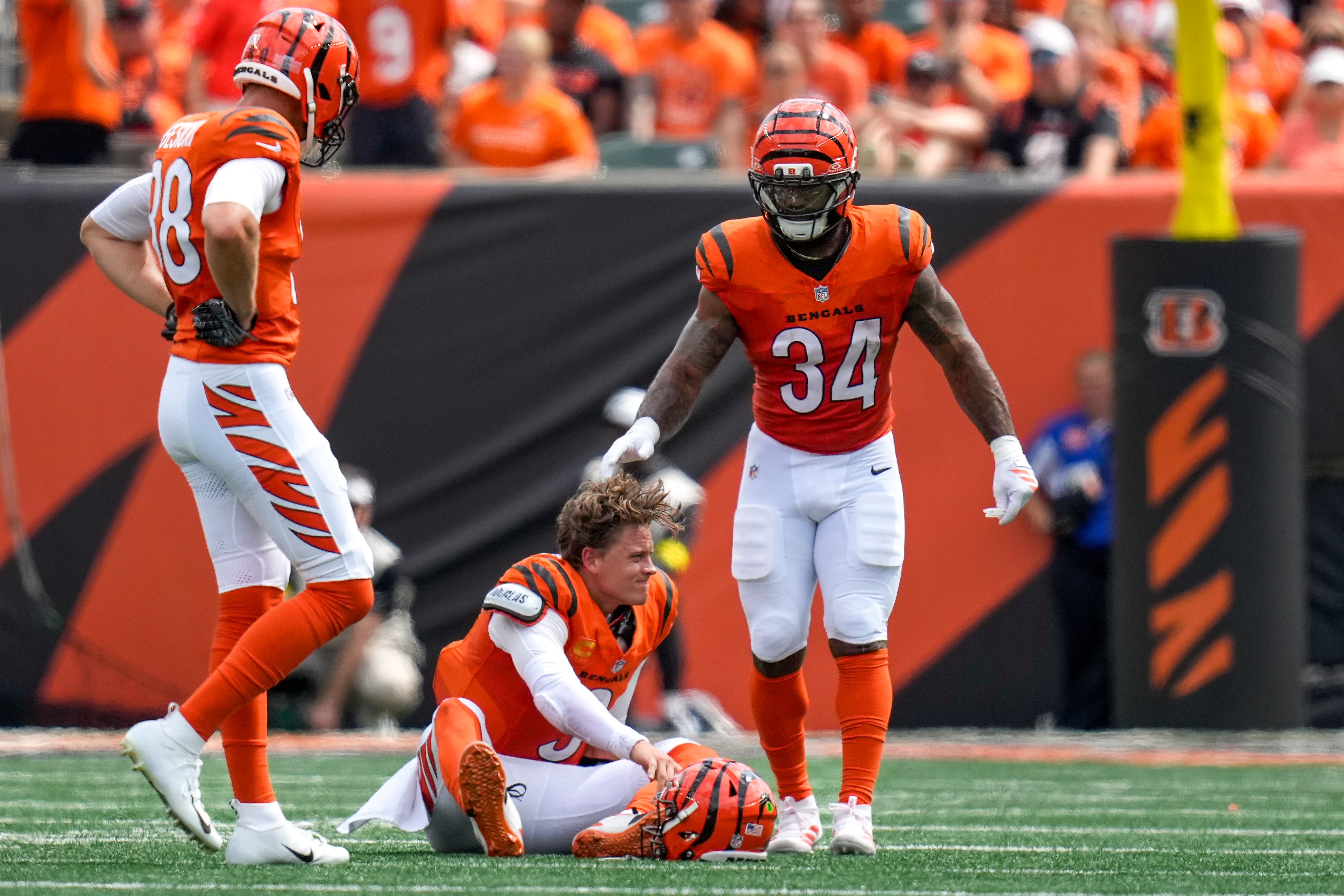 Cincinnati Bengals quarterback Joe Burrow (9) is injured on a play in the second quarter of the NFL Week 2 game between the Cincinnati Bengals and the Jacksonville Jaguars at Paycor Stadium in downtown Cincinnati on Sunday, Sept. 14, 2025. The Jaguars led 17-10 at halftime.