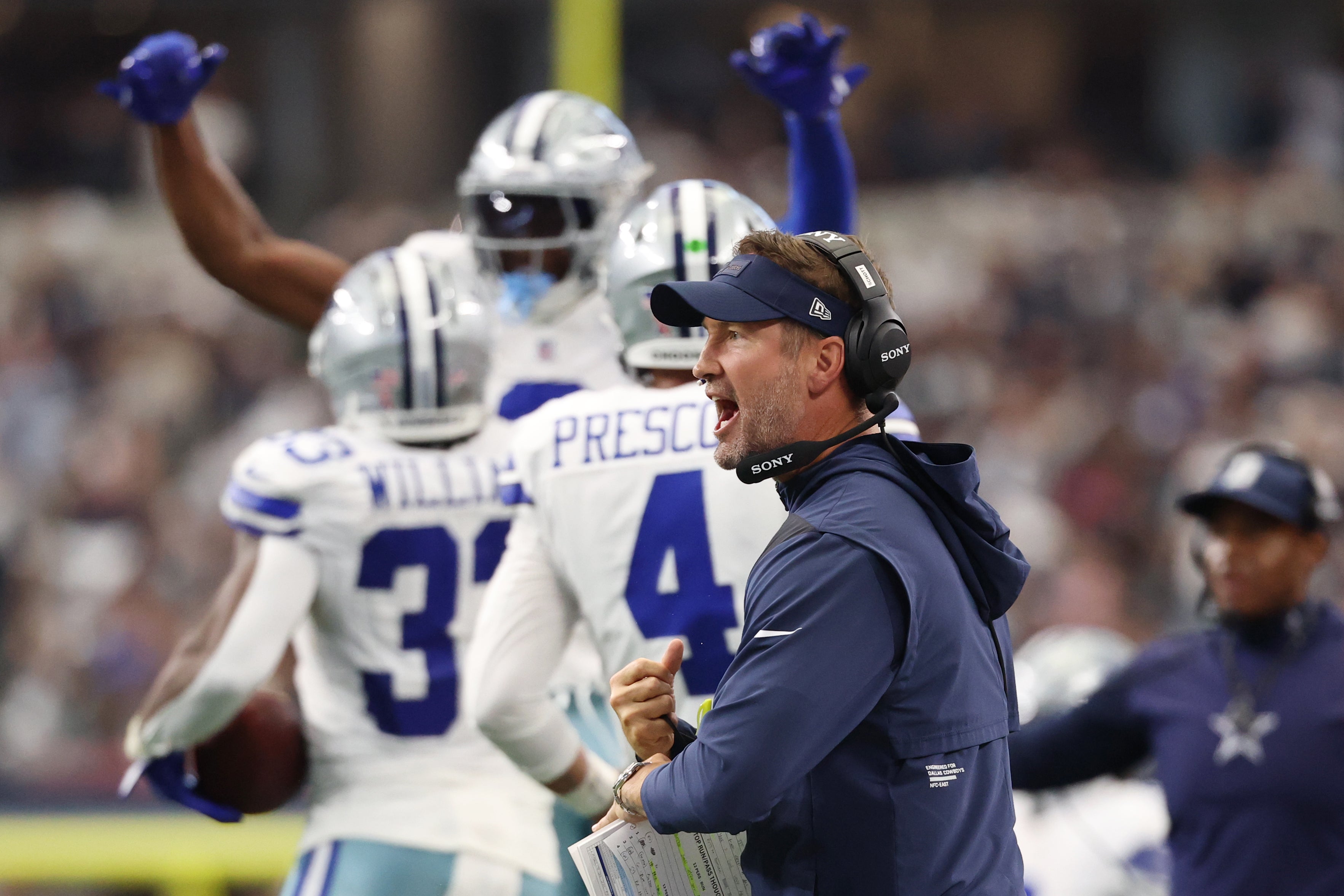 Dallas Cowboys head coach Brian Schottenheimer celebrates after a touchdown against the New York Giants during the third quarter at AT&T Stadium.