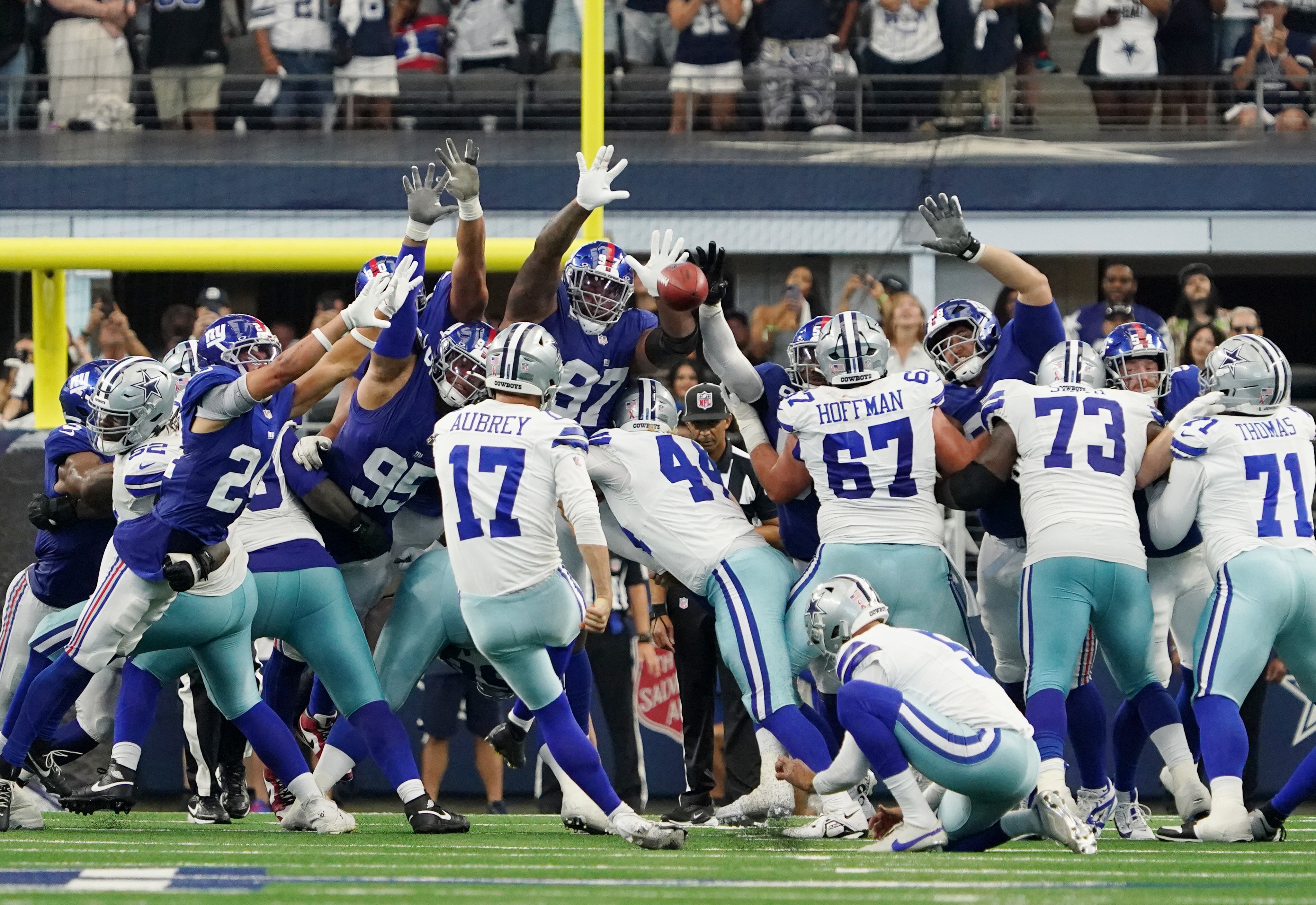 Sep 14, 2025; Arlington, Texas, USA; Dallas Cowboys place kicker Brandon Aubrey (17) makes a game-winning field goal against the New York Giants during overtime at AT&T Stadium.