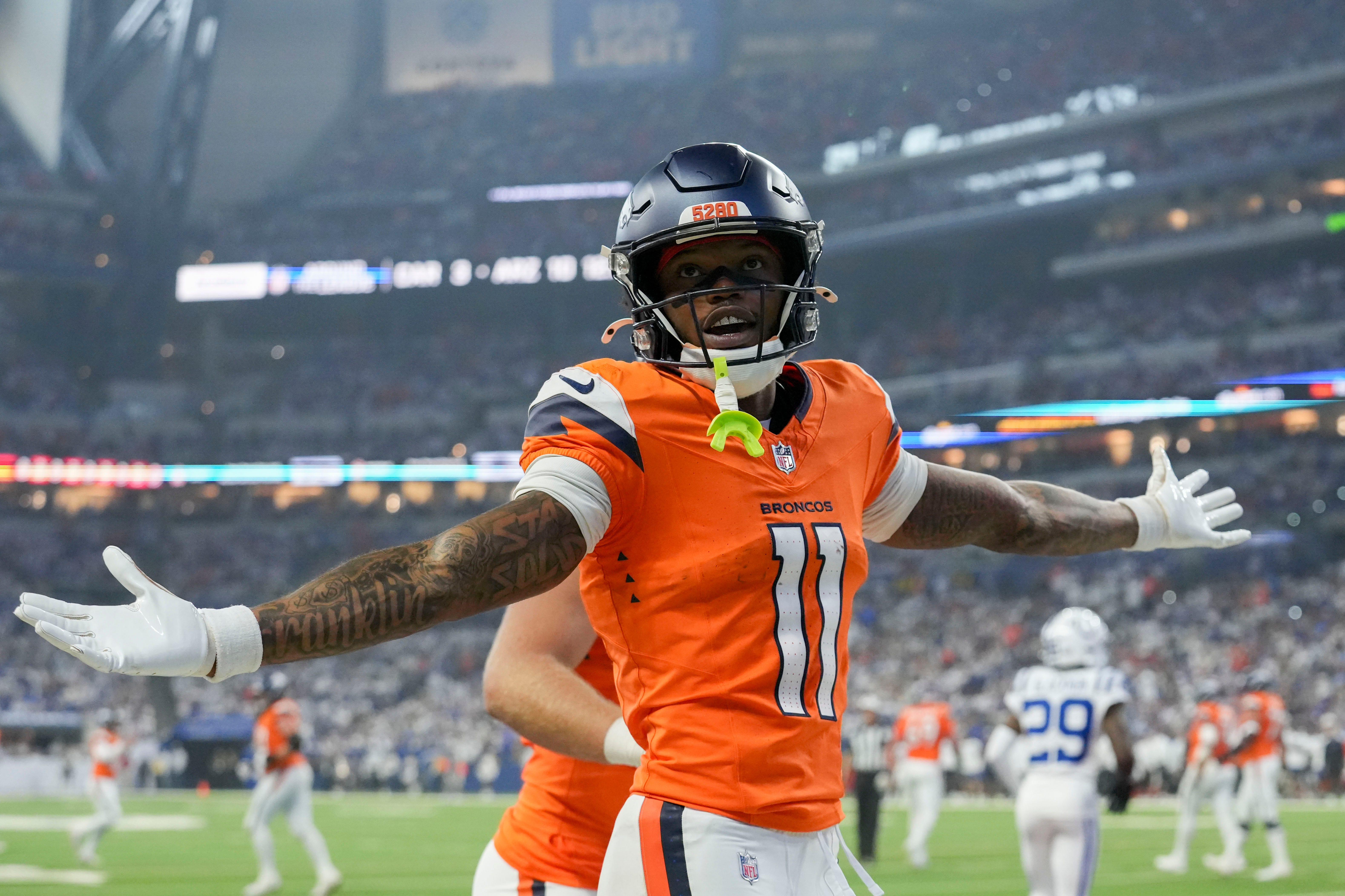 Denver Broncos wide receiver Troy Franklin (11) celebrates a touchdown Sunday, Sept. 14, 2025, during a game against the Indianapolis Colts at Lucas Oil Stadium in Indianapolis.
