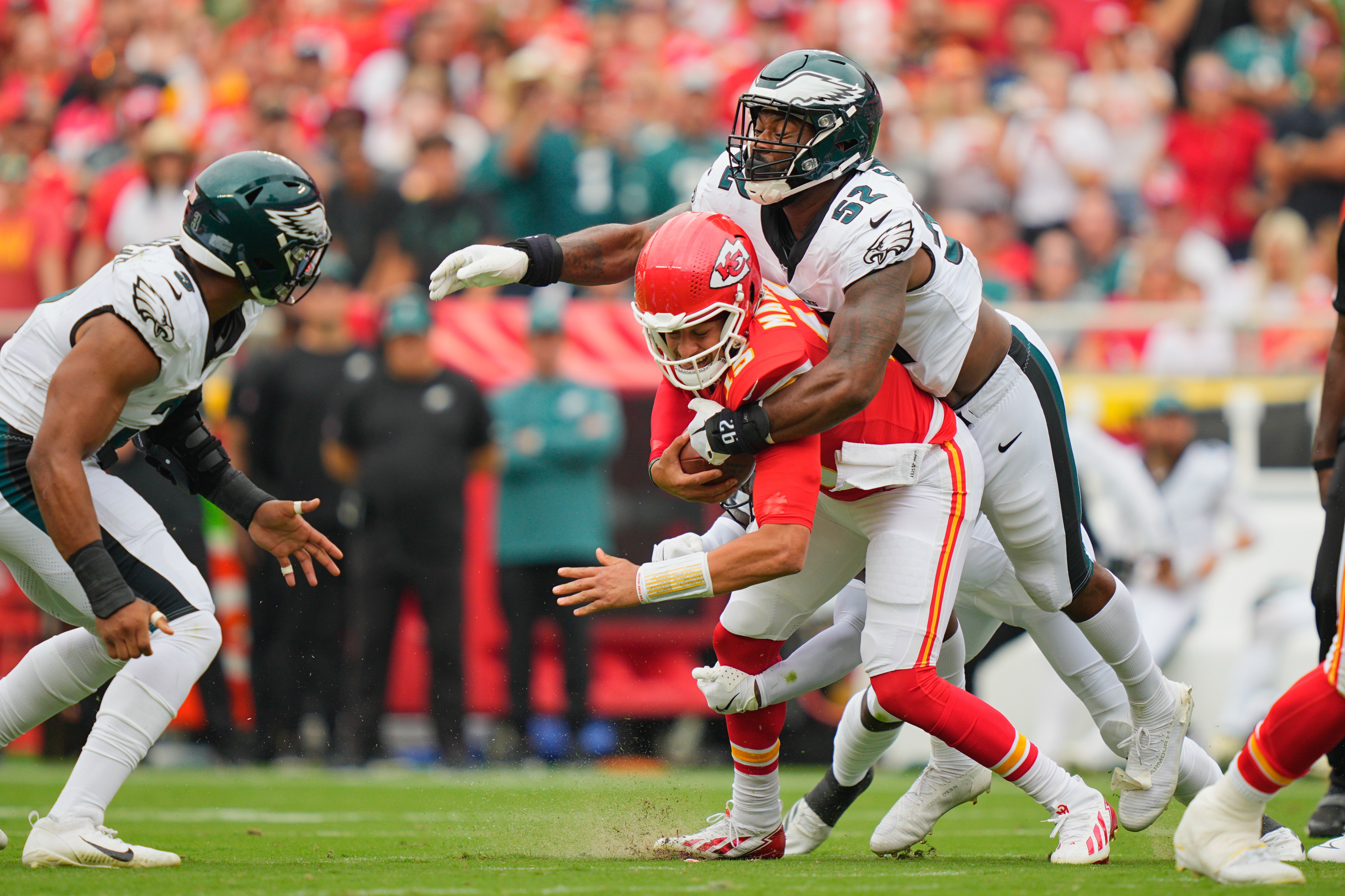 Philadelphia Eagles defensive end Za'Darius Smith (52) sacks Kansas City Chiefs quarterback Patrick Mahomes (15) during the second quarter of the game at GEHA Field at Arrowhead Stadium.