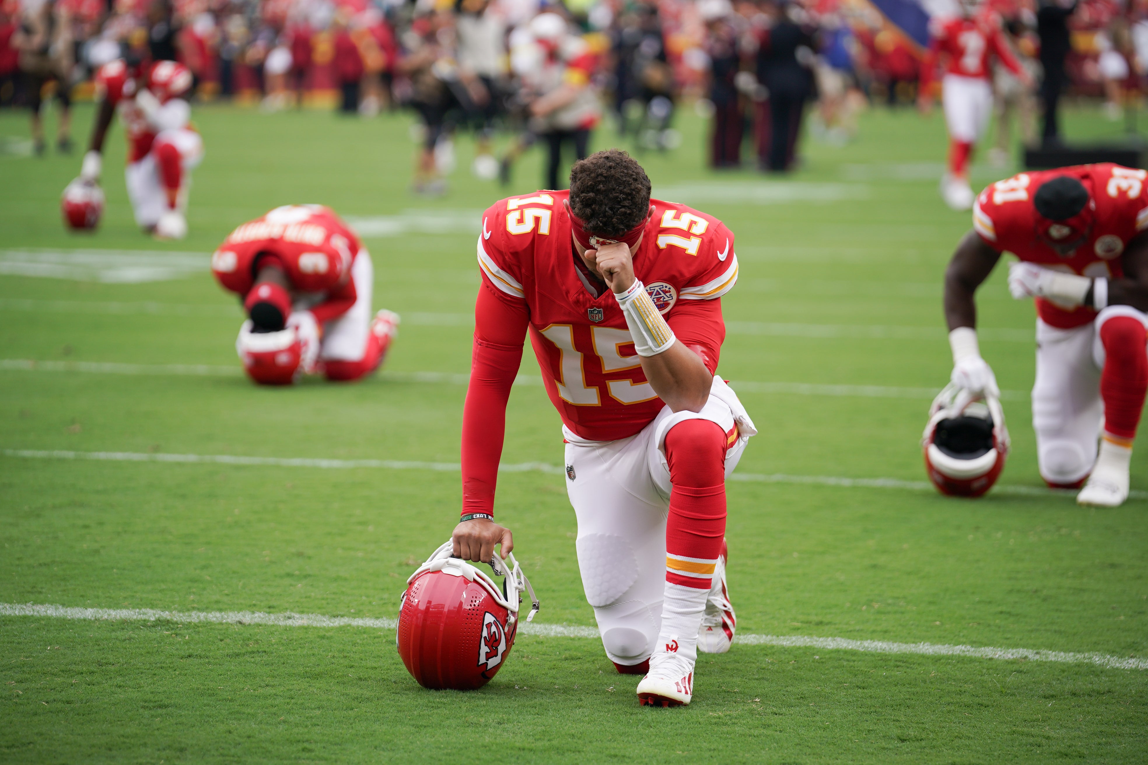 Kansas City Chiefs quarterback Patrick Mahomes (15) looks on prior to the game against the Philadelphia Eagles at GEHA Field at Arrowhead Stadium.
