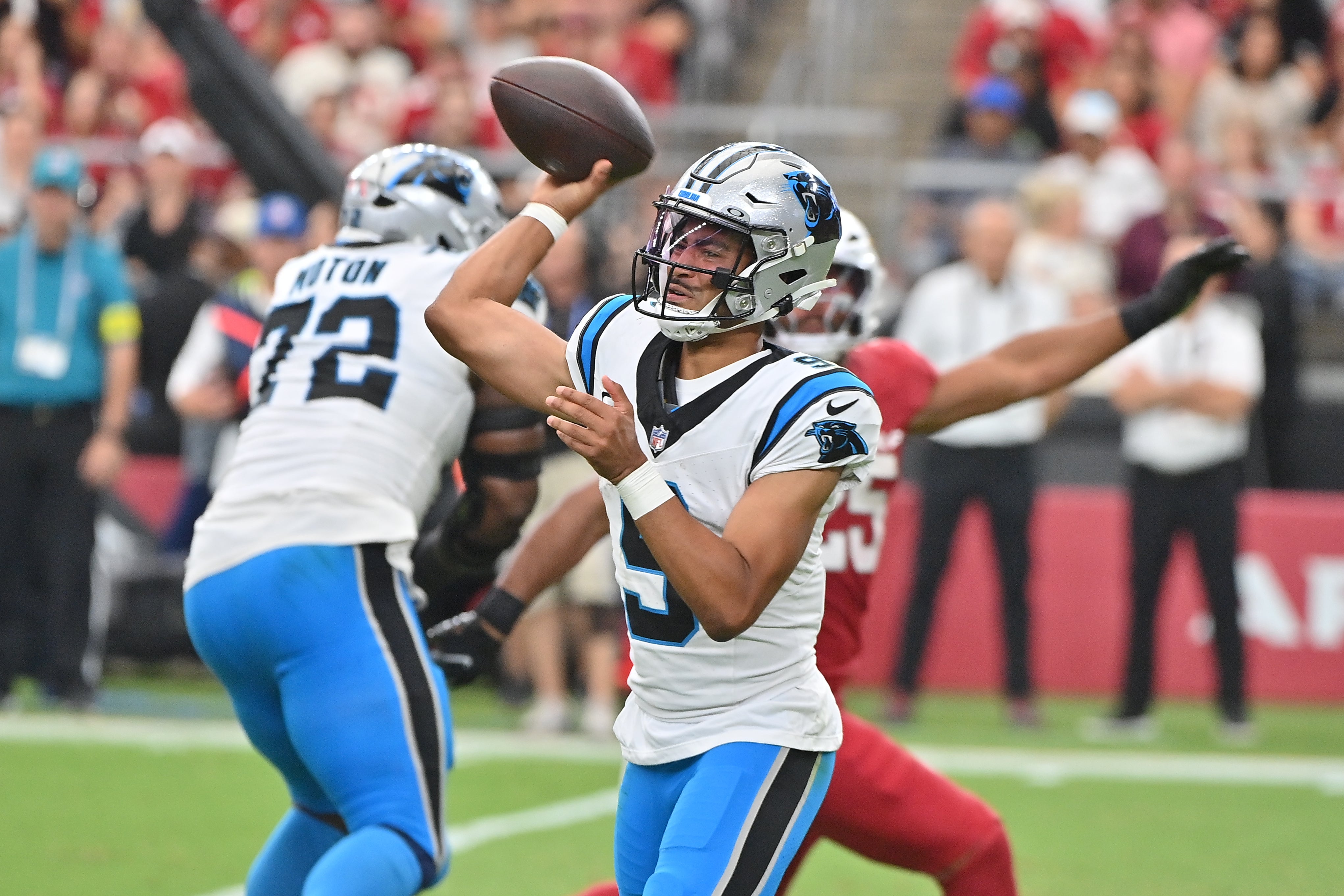 Sep 14, 2025; Glendale, Arizona, USA; Carolina Panthers quarterback Bryce Young (9) throws a pass during the fourth quarter against the Arizona Cardinals at State Farm Stadium.