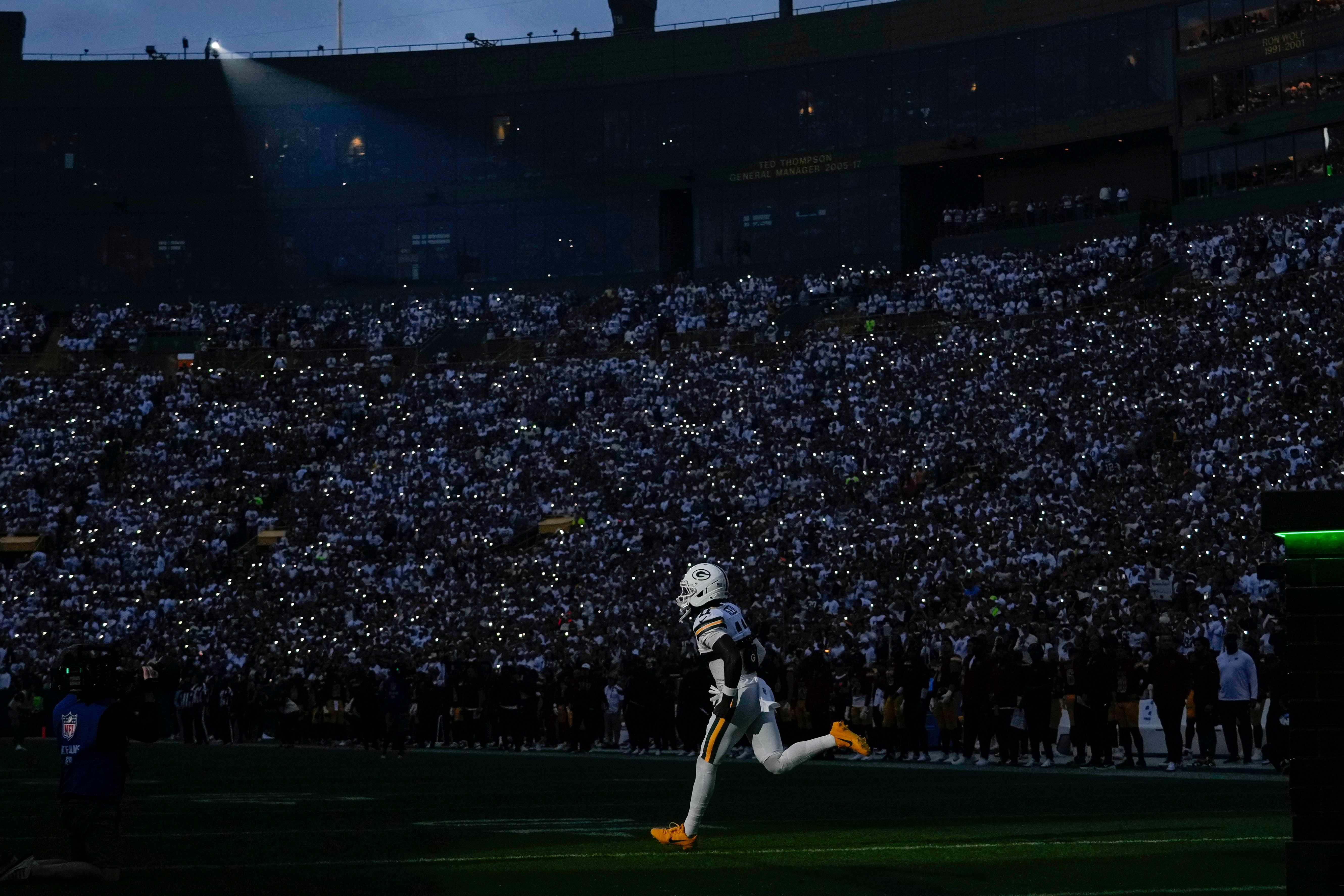 Sep 11, 2025; Green Bay, Wisconsin, USA; Green Bay Packers wide receiver Jayden Reed (11) runs onto the field prior to the game against the Washington Commanders at Lambeau Field.