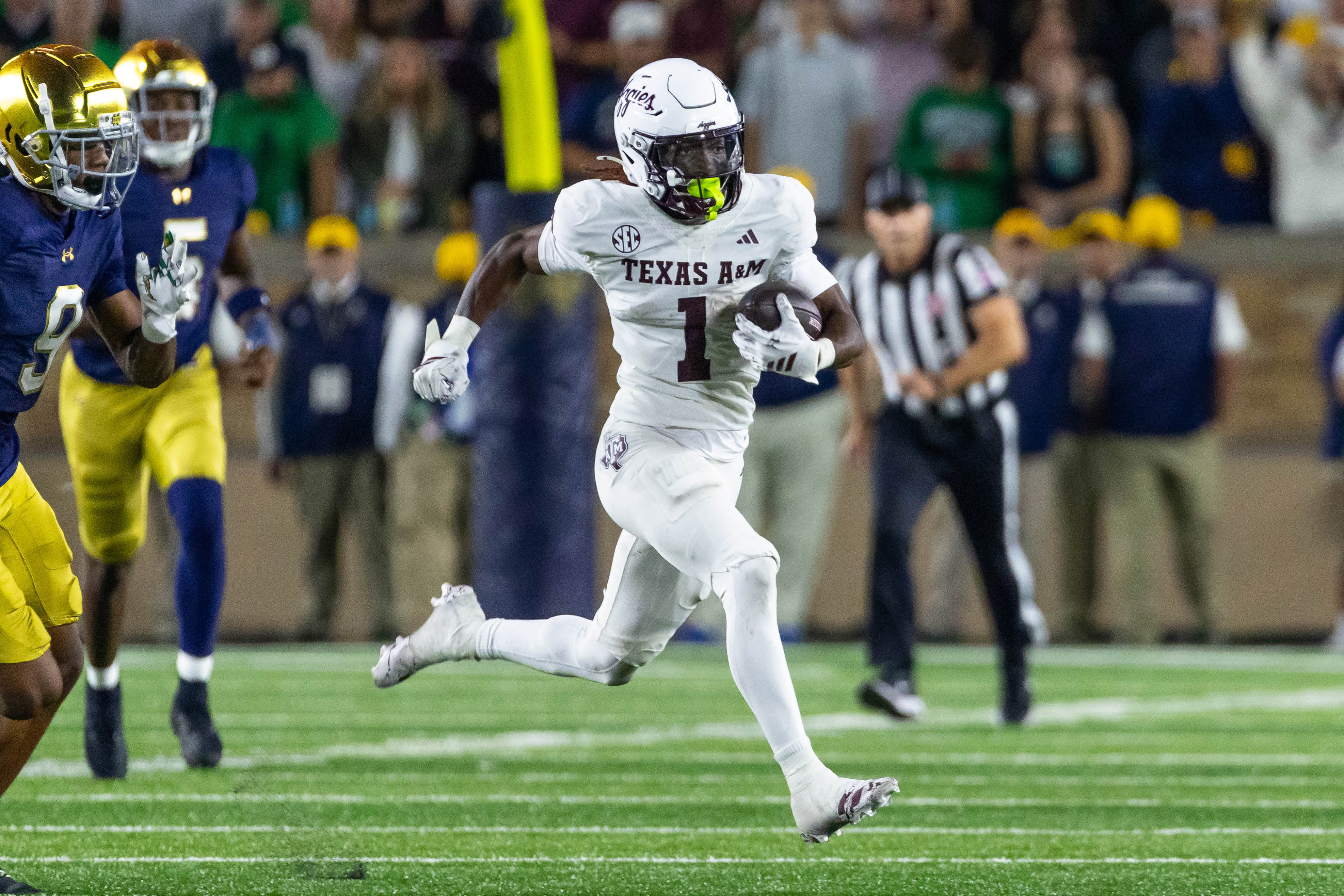 Sep 13, 2025; South Bend, Indiana, USA; Texas A&M Aggies wide receiver Mario Craver (1) runs the ball during the second half against the Notre Dame Fighting Irish at Notre Dame Stadium. Mandatory Credit: Michael Caterina-Imagn Images