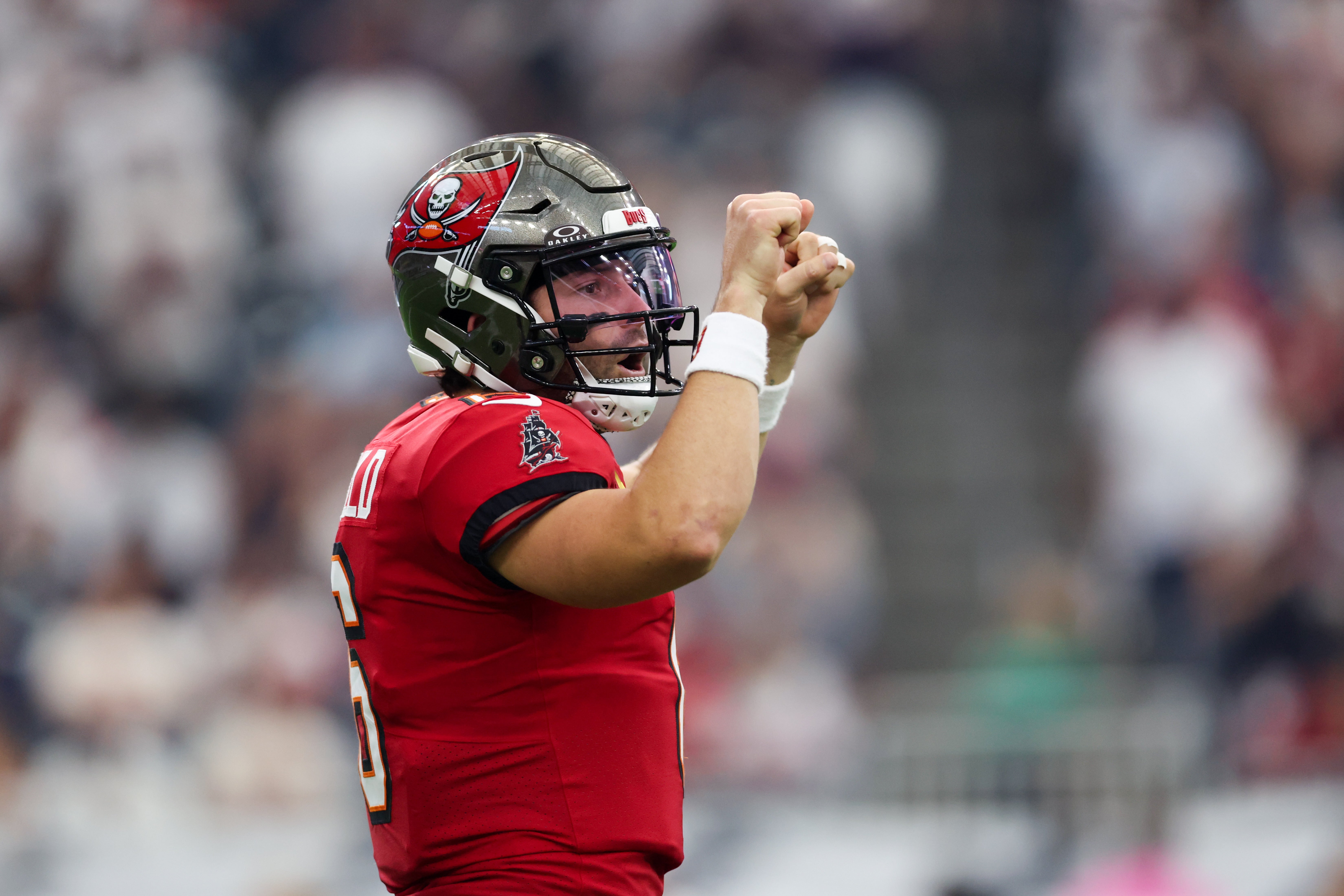 Sep 15, 2025; Houston, Texas, USA; Tampa Bay Buccaneers quarterback Baker Mayfield (6) motions during the first quarter against the Houston Texans at NRG Stadium.