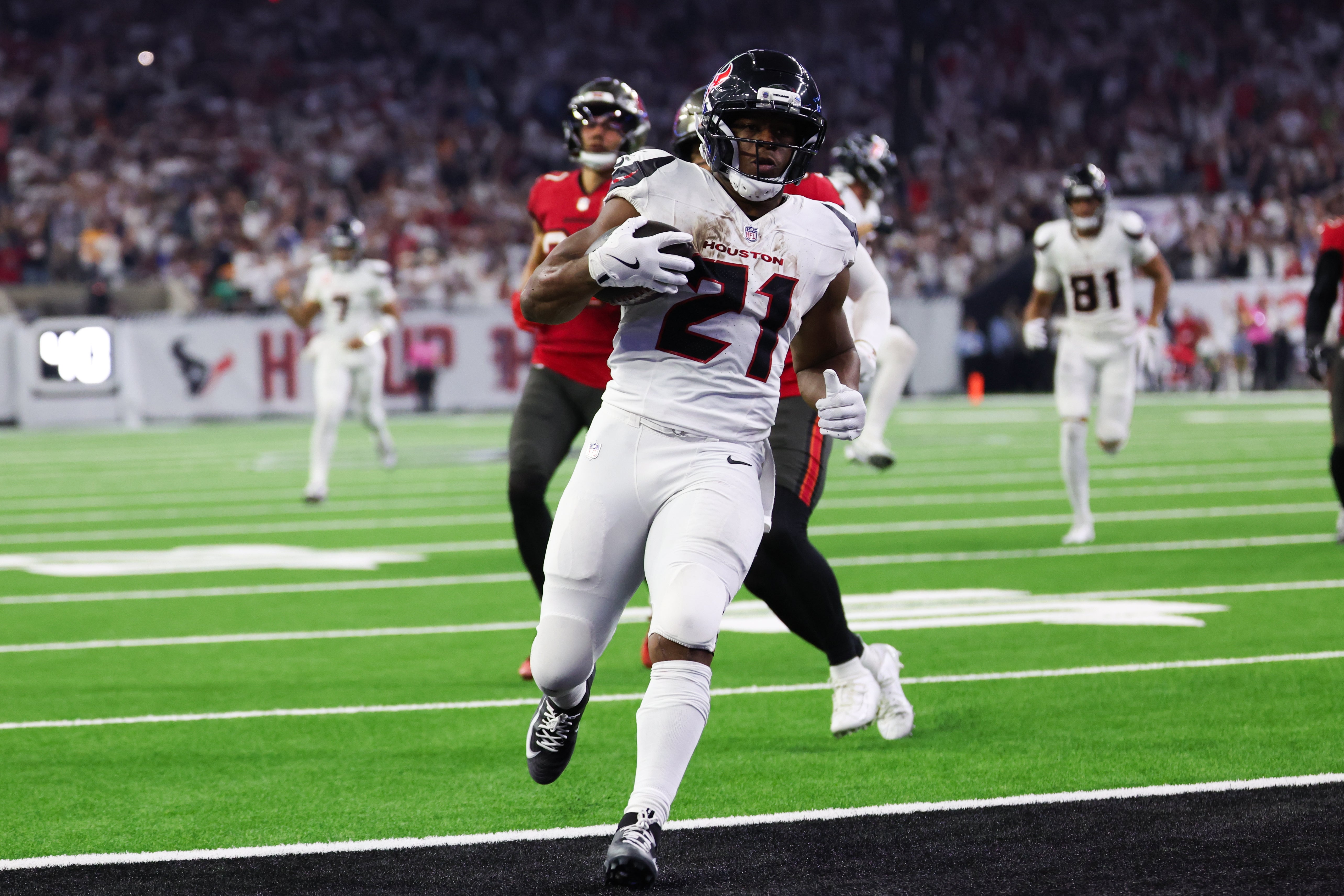 Sep 15, 2025; Houston, Texas, USA; Houston Texans running back Nick Chubb (21) rushes the ball for a touchdown during the fourth quarter against the Tampa Bay Buccaneers at NRG Stadium.