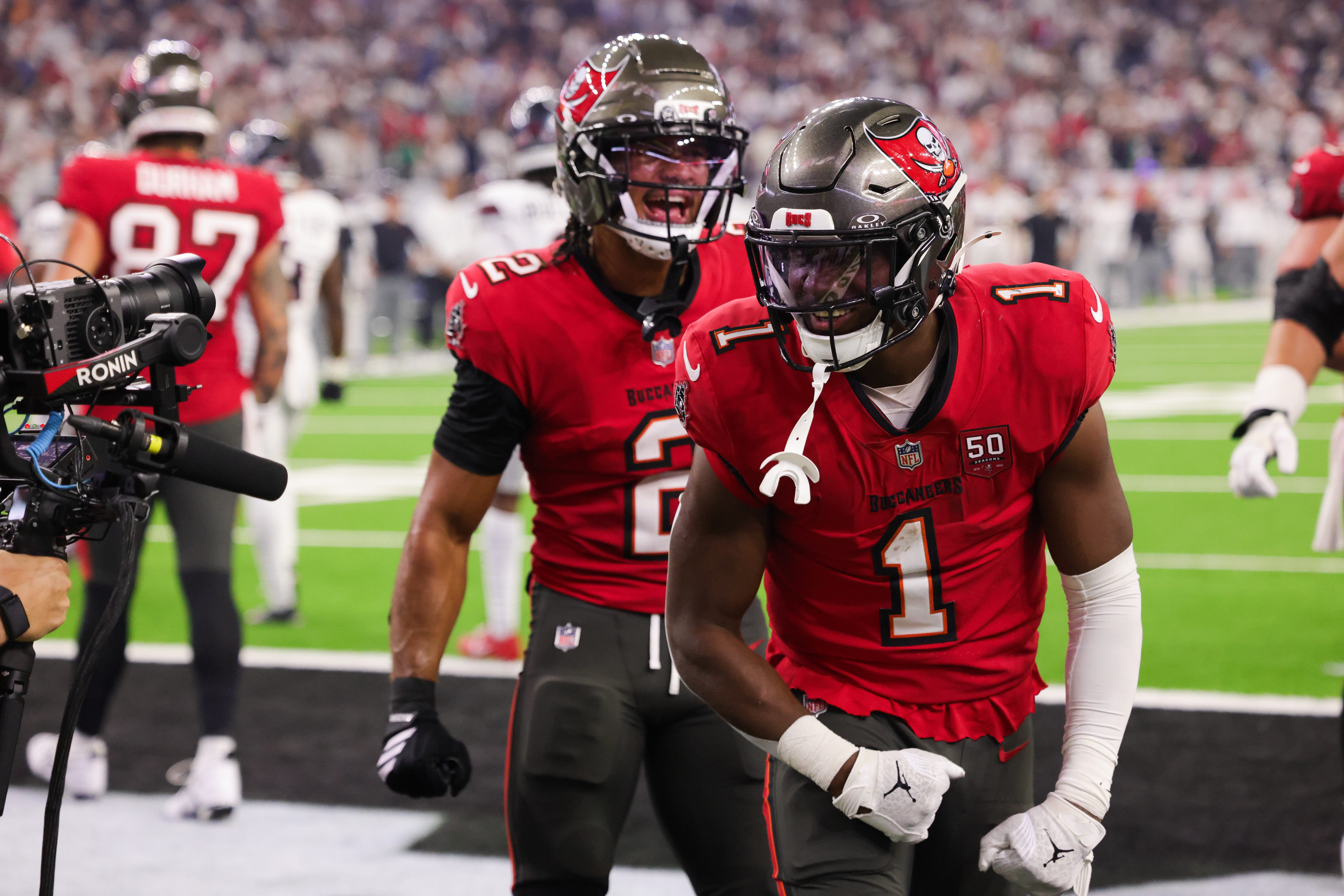 Sep 15, 2025; Houston, Texas, USA; Tampa Bay Buccaneers running back Rachaad White (1) celebrates after scoring a touchdown during the fourth quarter against the Houston Texans at NRG Stadium.