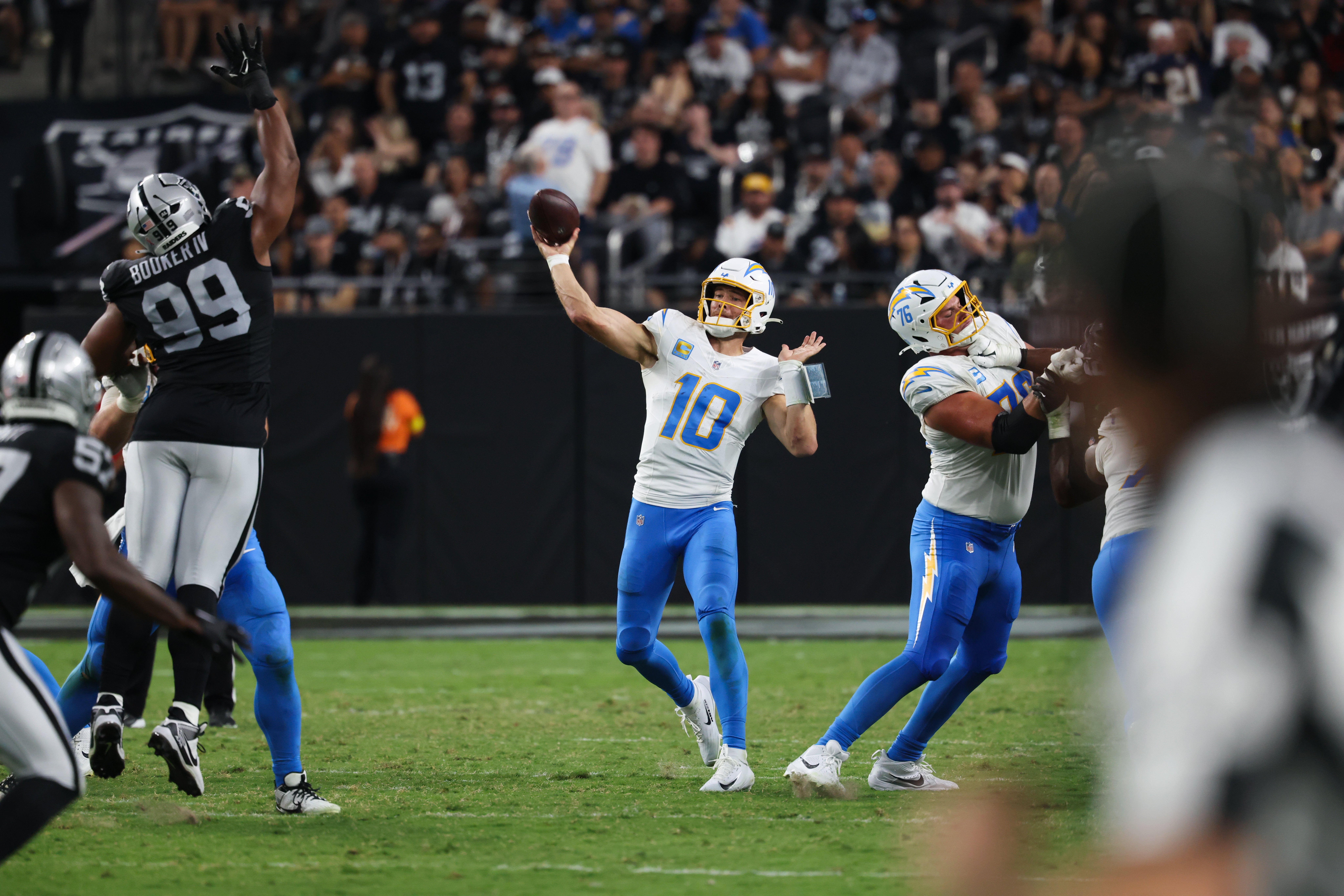Sep 15, 2025; Paradise, Nevada, USA; Los Angeles Chargers quarterback Justin Herbert (10) throws a pass during the second quarter against the Las Vegas Raiders at Allegiant Stadium. Mandatory Credit: Kiyoshi Mio-Imagn Images