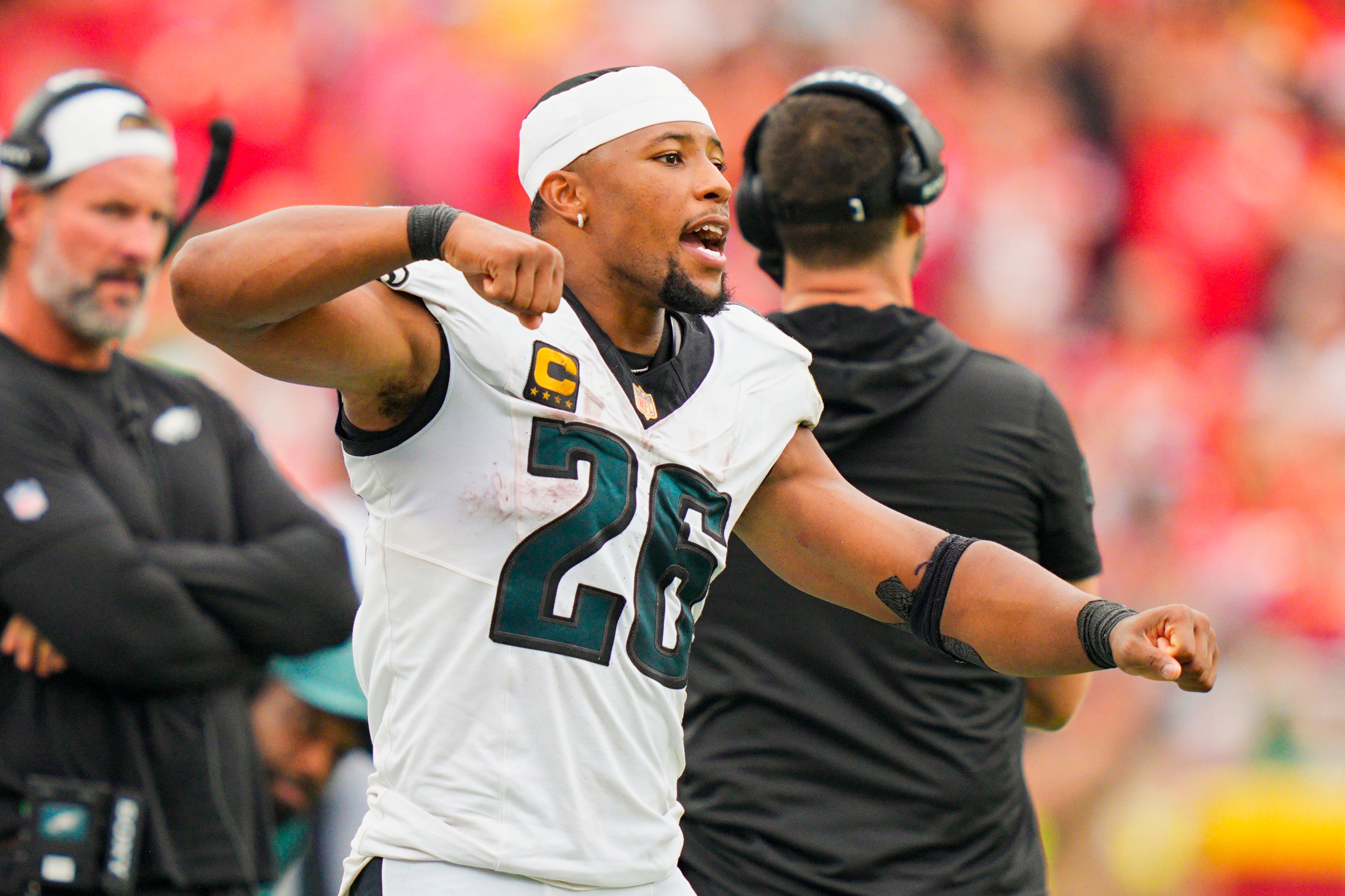 Sep 14, 2025; Kansas City, Missouri, USA; Philadelphia Eagles running back Saquon Barkley (26) reacts during the second half against the Kansas City Chiefs at GEHA Field at Arrowhead Stadium.
