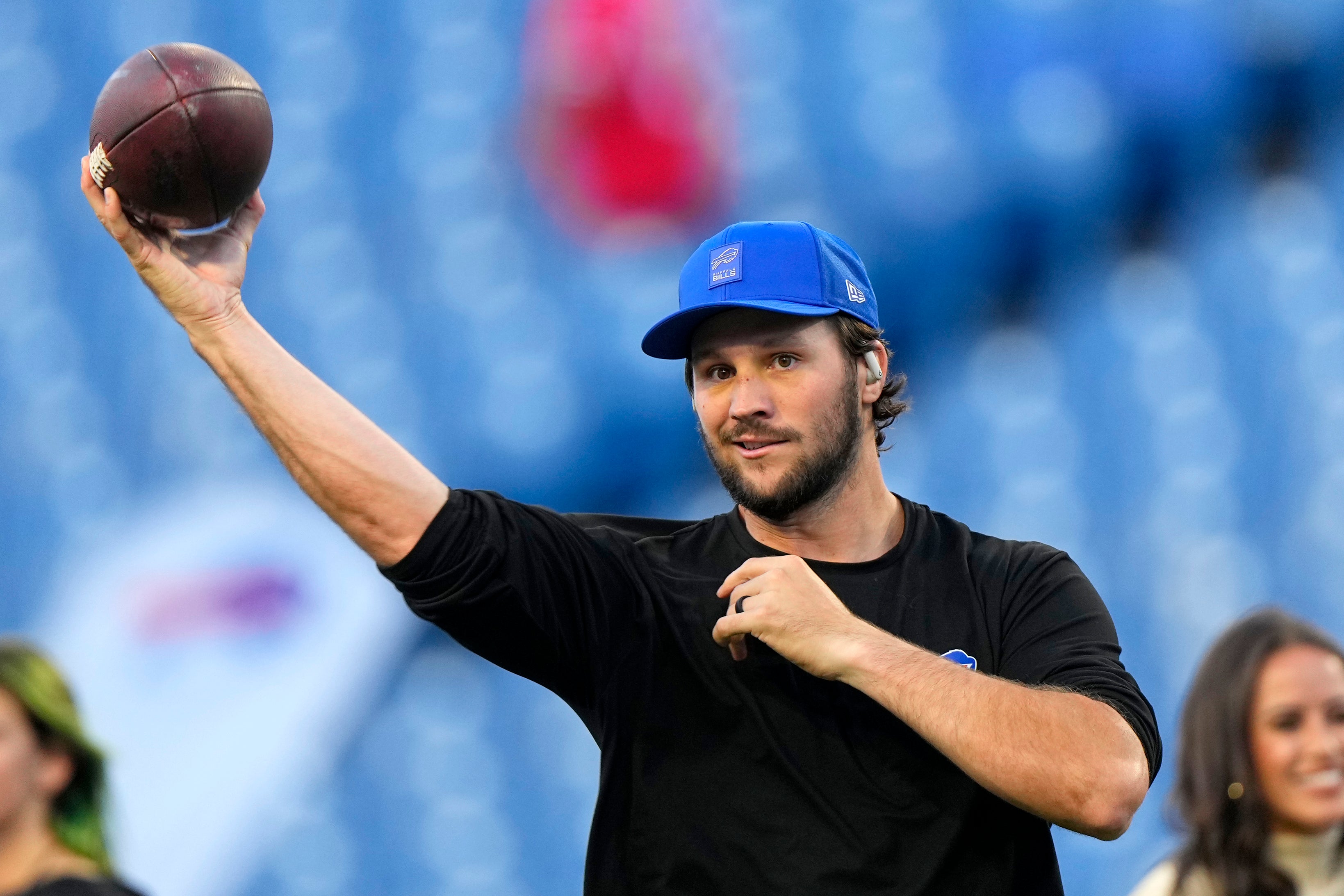 Sep 18, 2025; Orchard Park, New York, USA; Buffalo Bills quarterback Josh Allen (17) warms up before the game against the Miami Dolphins at Highmark Stadium.