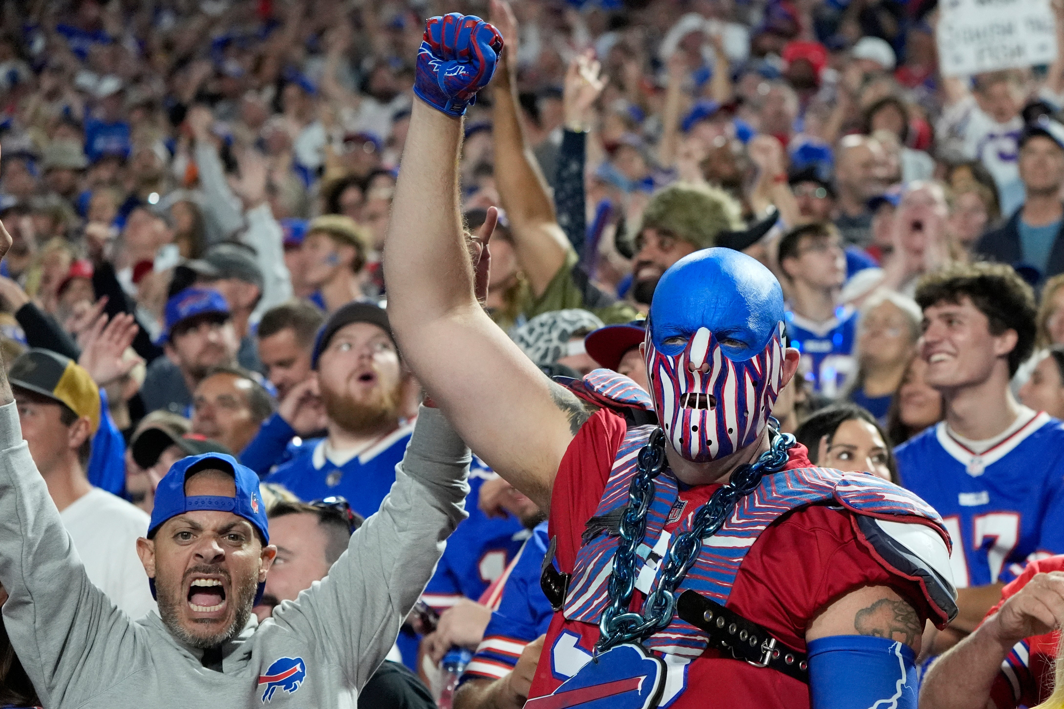 Sep 18, 2025; Orchard Park, New York, USA; Fans cheer in the fourth quarter between the Buffalo Bills and the Miami Dolphins at Highmark Stadium.