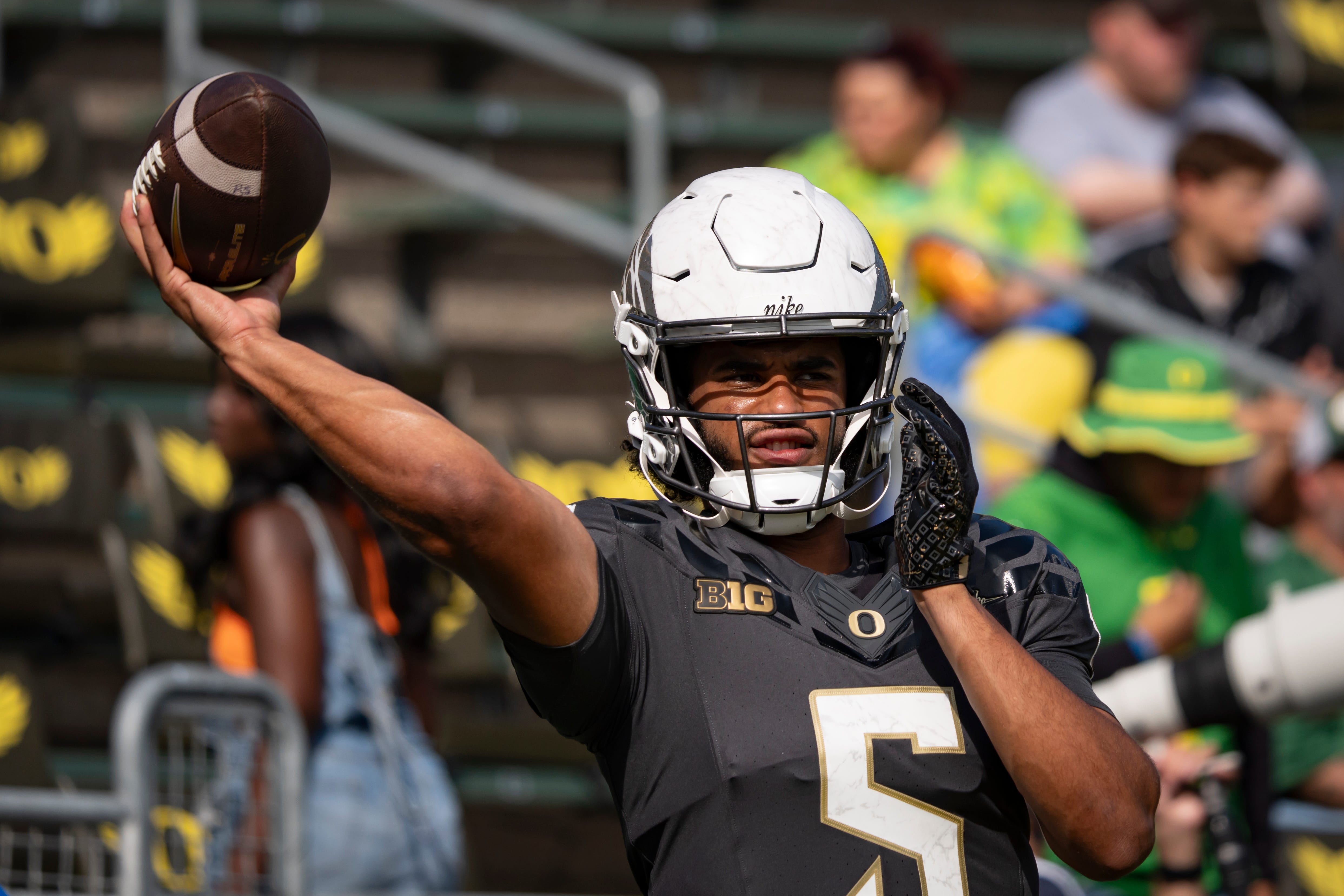 Oregon Ducks quarterback Dante Moore throws a pass during warmups as the Oregon Ducks host the Oregon State Beavers Sept. 20, 2025, at Autzen Stadium in Eugene, Oregon.