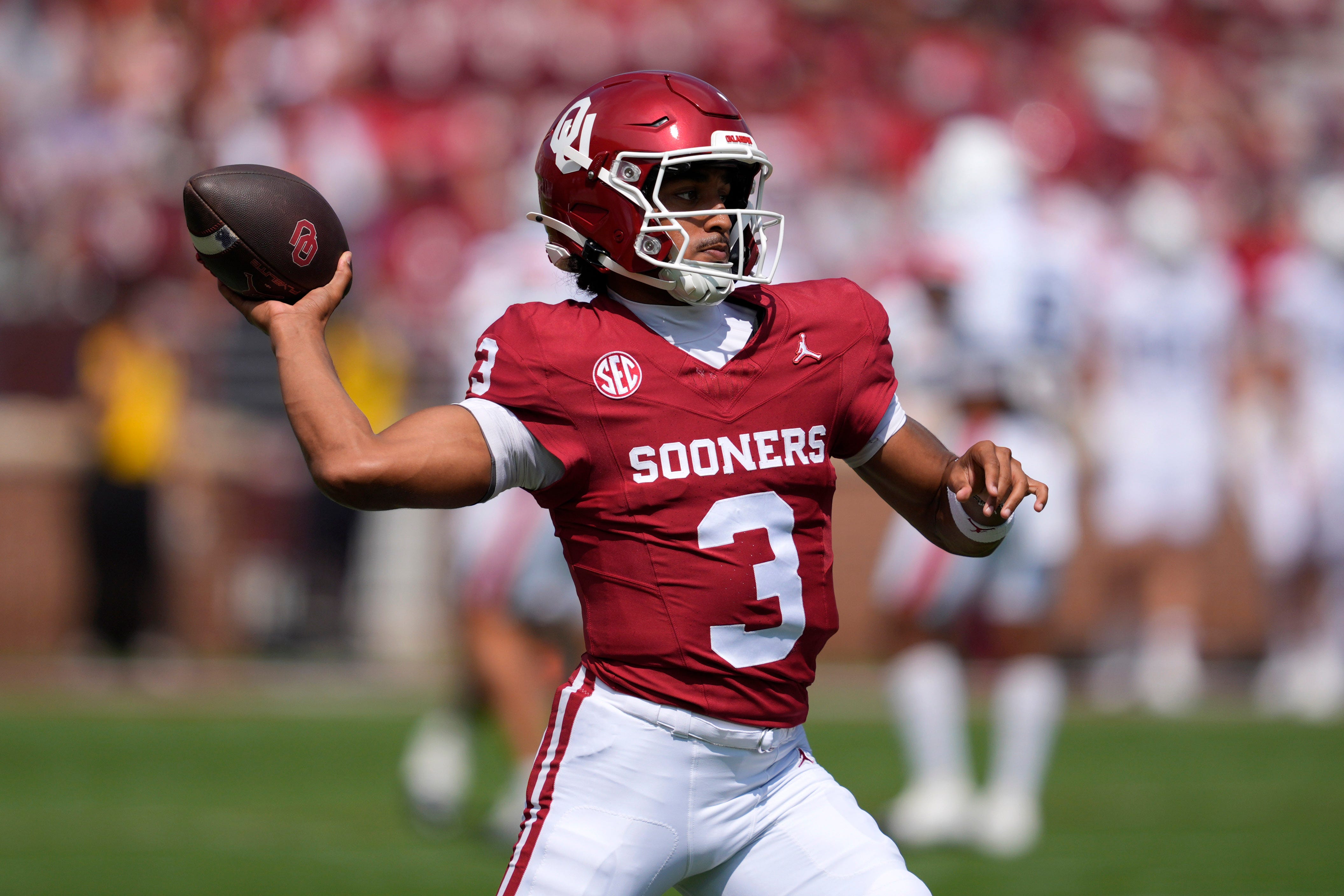 Oklahoma Sooners quarterback Michael Hawkins Jr. (3) warms up before a college football game between the University of Oklahoma Sooners (OU) and the Auburn Tigers at Gaylord Family Ð Oklahoma Memorial Stadium in Norman, Okla., Saturday, Sept. 20, 2025.