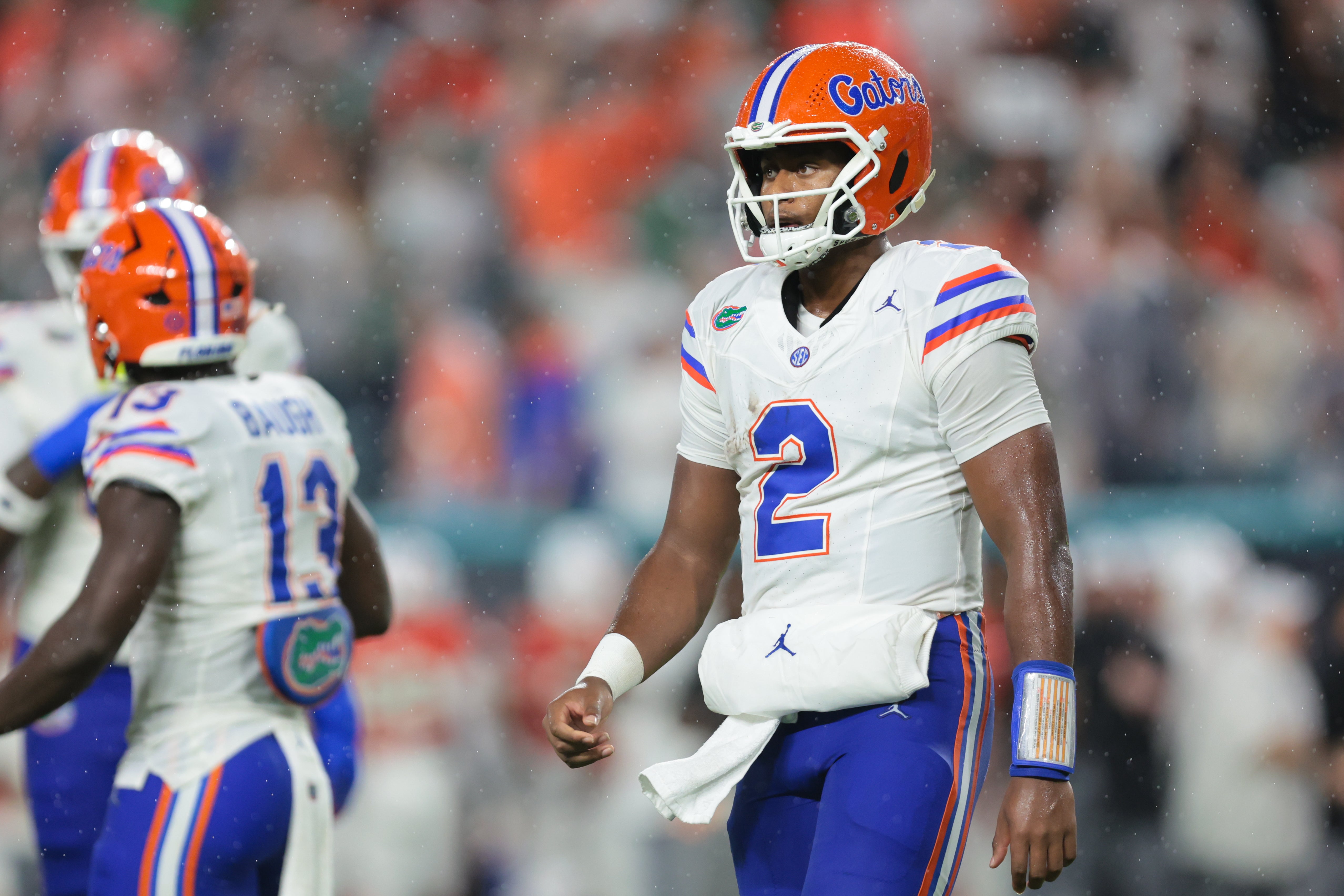Sep 20, 2025; Miami Gardens, Florida, USA; Florida Gators quarterback DJ Lagway (2) looks on from the field against the Miami Hurricanes during the first quarter at Hard Rock Stadium.