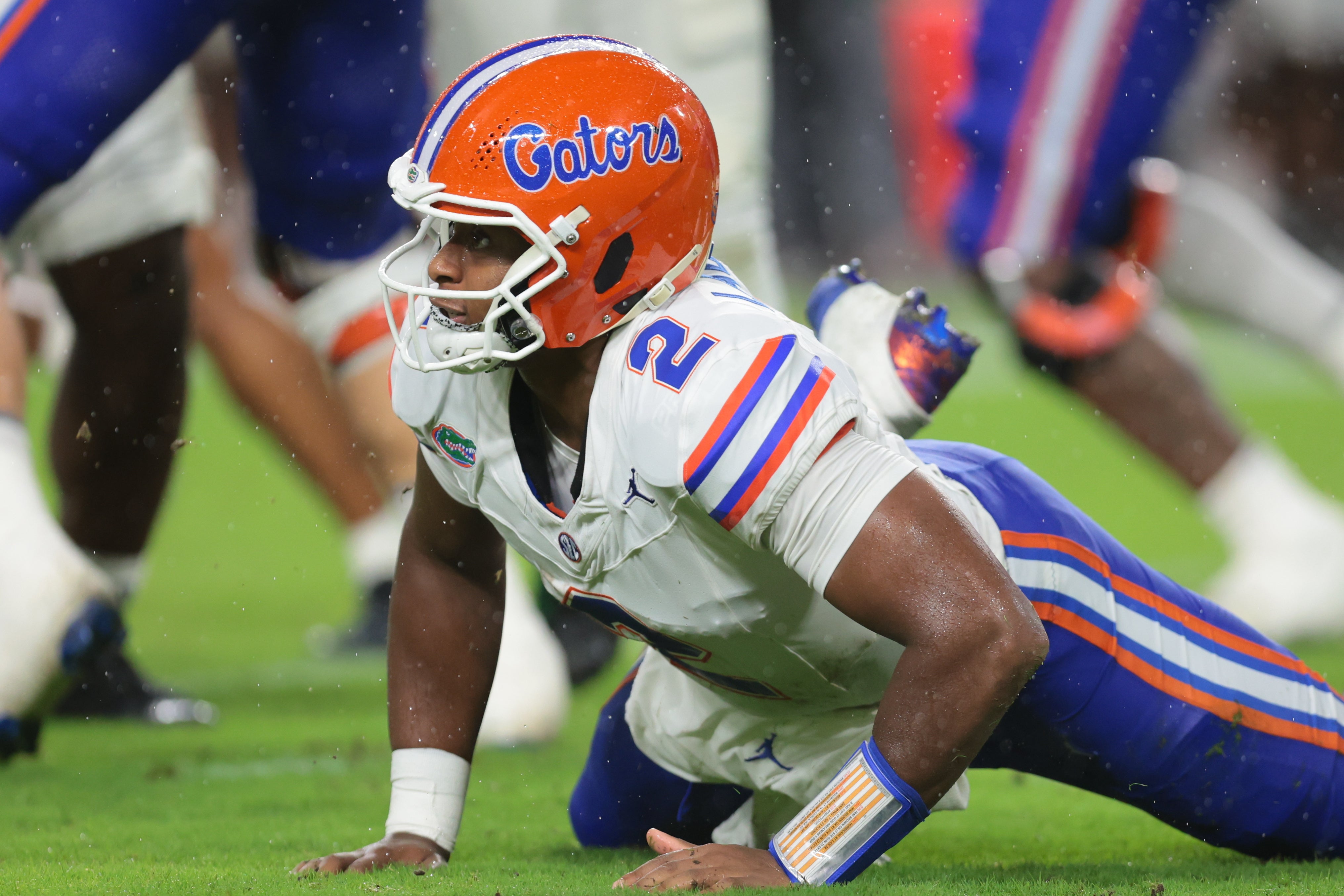 Sep 20, 2025; Miami Gardens, Florida, USA; Florida Gators quarterback DJ Lagway (2) watches after tossing the football against the Miami Hurricanes during the first quarter at Hard Rock Stadium.