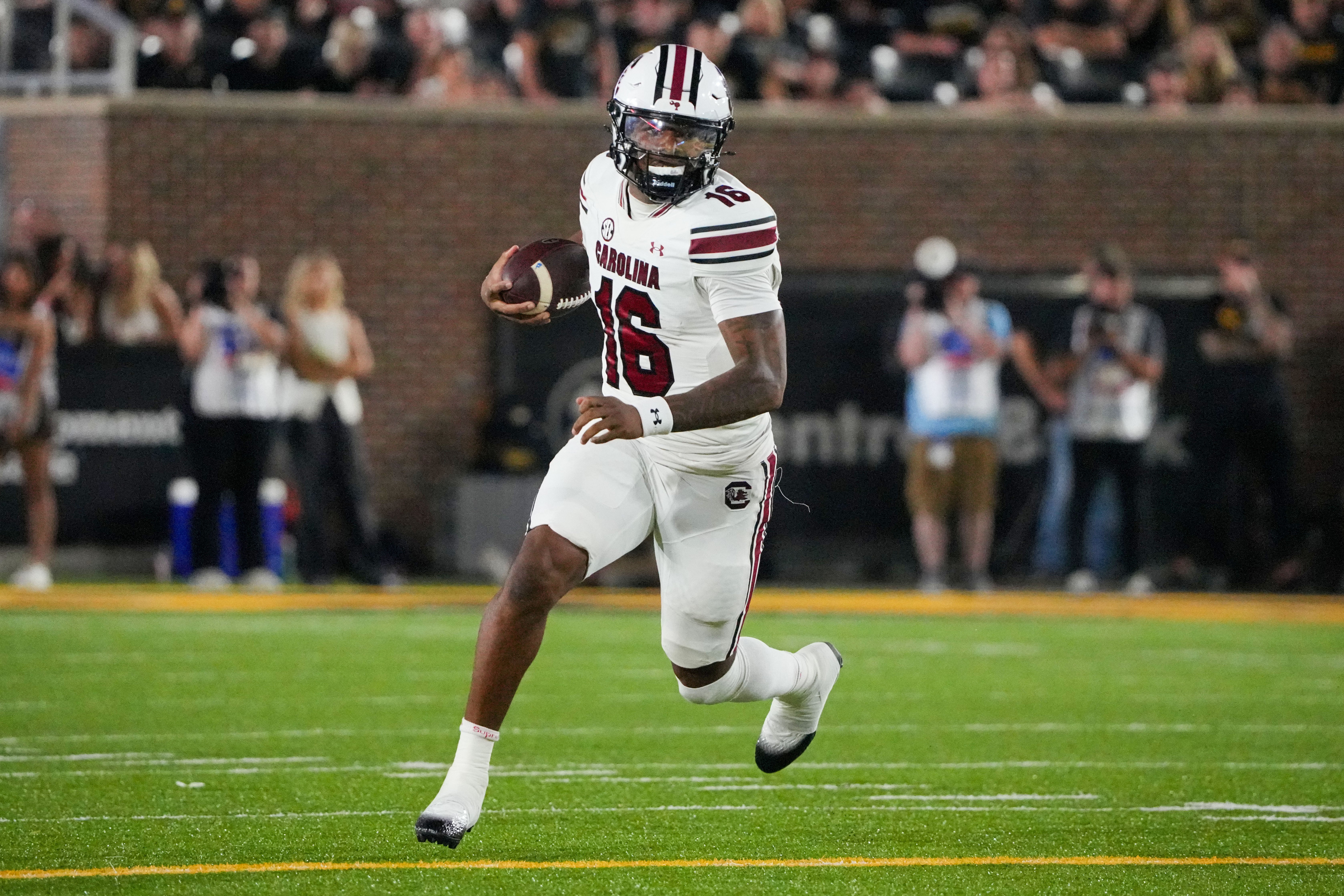 Sep 20, 2025; Columbia, Missouri, USA; South Carolina Gamecocks quarterback LaNorris Sellers (16) runs the ball against the Missouri Tigers during the second half of the game at Faurot Field at Memorial Stadium. Mandatory Credit: Denny Medley-Imagn Images