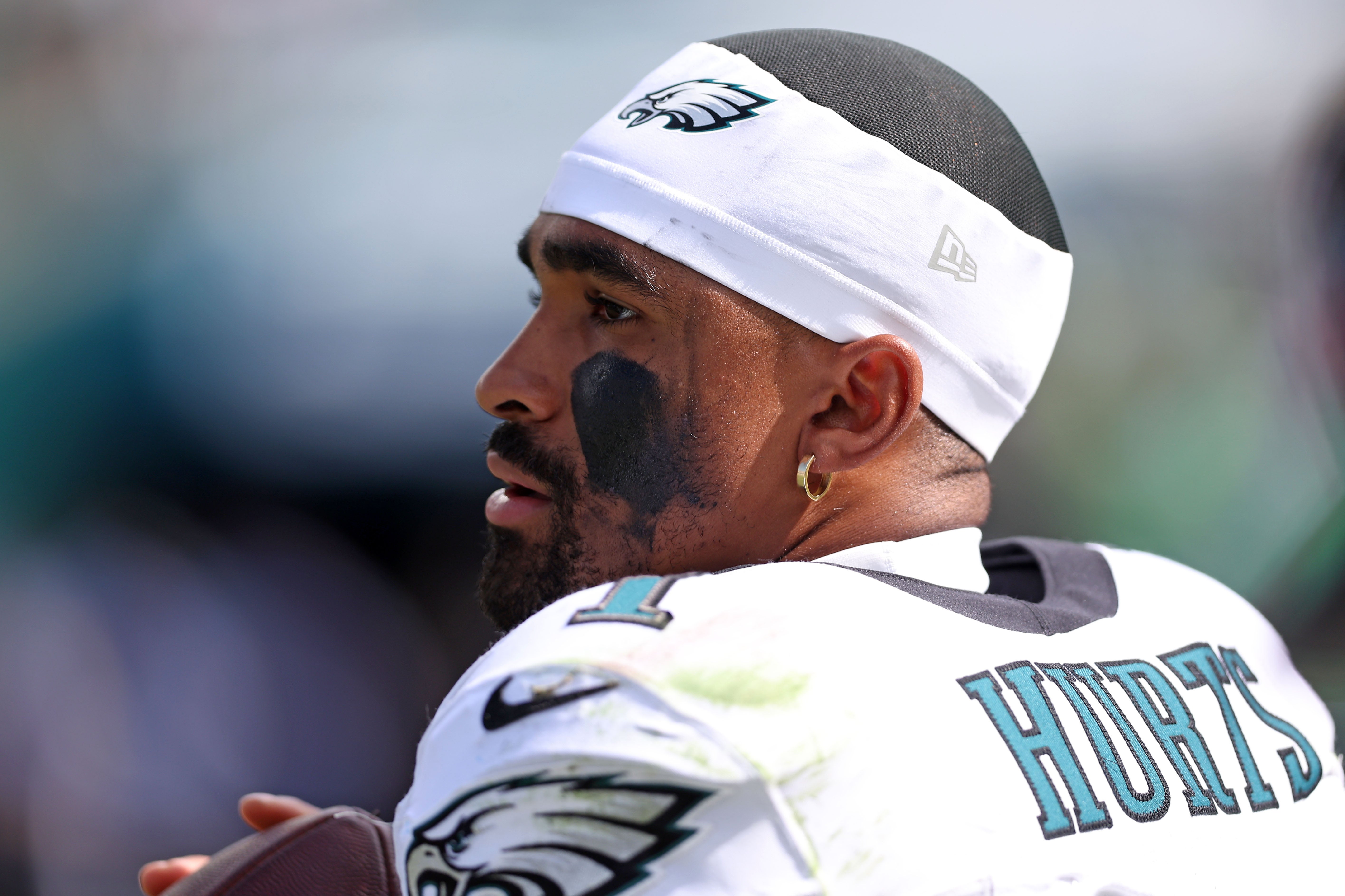 Philadelphia Eagles quarterback Jalen Hurts (1) practices on the sidelines against the Los Angeles Rams during the first half at Lincoln Financial Field.