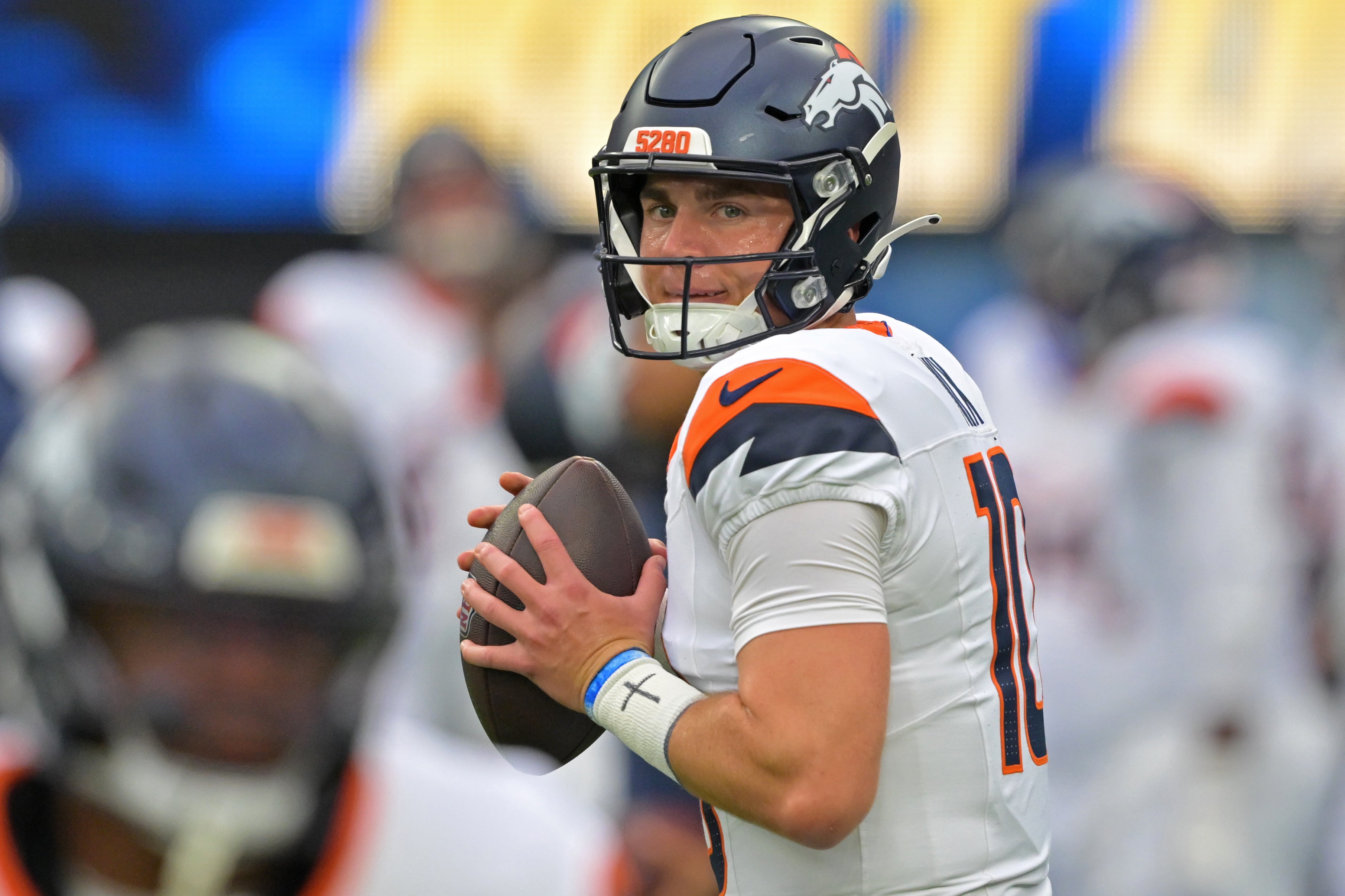 Sep 21, 2025; Inglewood, California, USA; Denver Broncos quarterback Bo Nix (10) warms up prior to the game against the Los Angeles Chargers at SoFi Stadium.