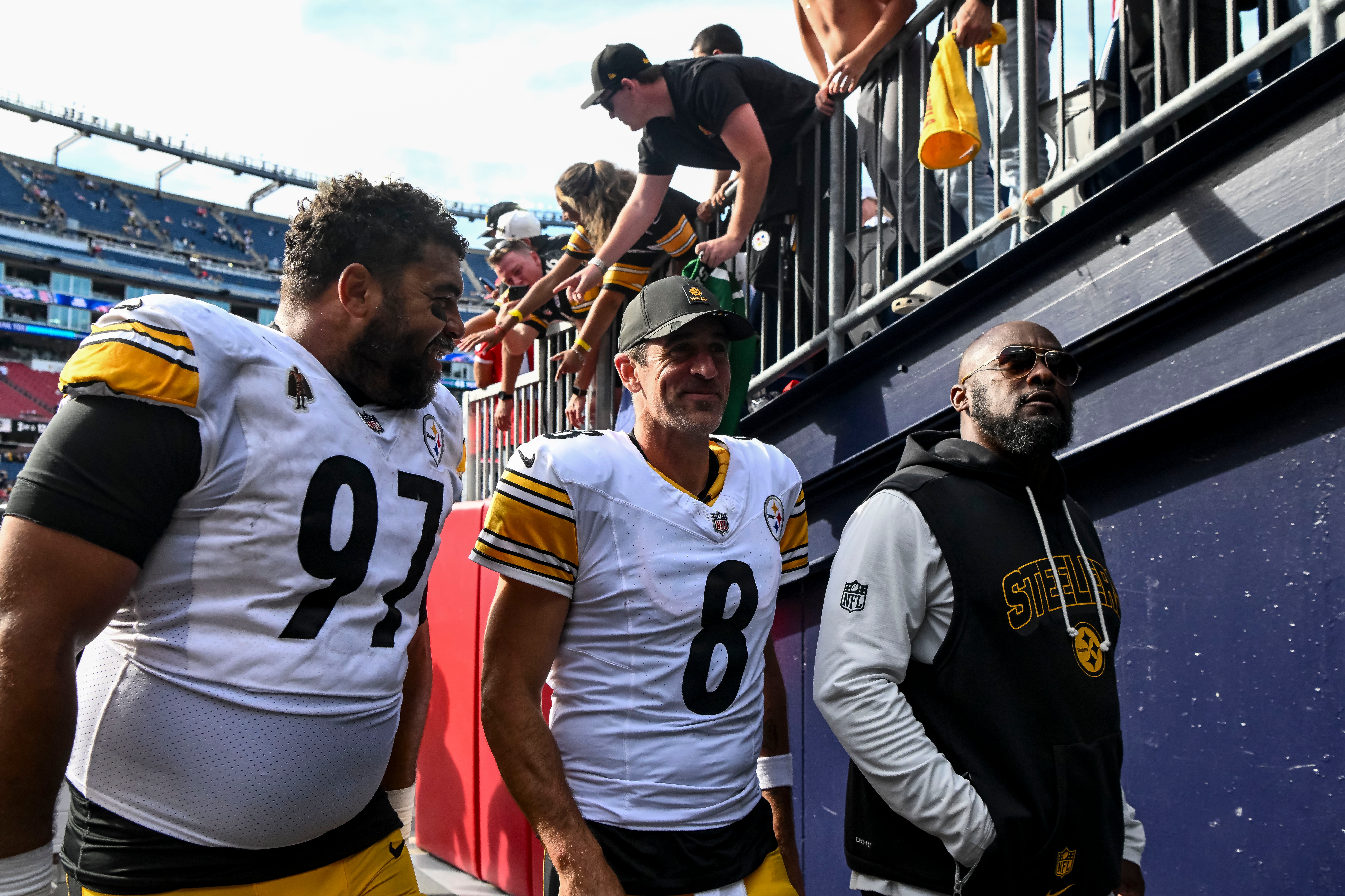 Sep 21, 2025; Foxborough, Massachusetts, USA; Pittsburgh Steelers defensive tackle Cameron Heyward (97) and Pittsburgh Steelers quarterback Aaron Rodgers (8) after the game at Gillette Stadium.